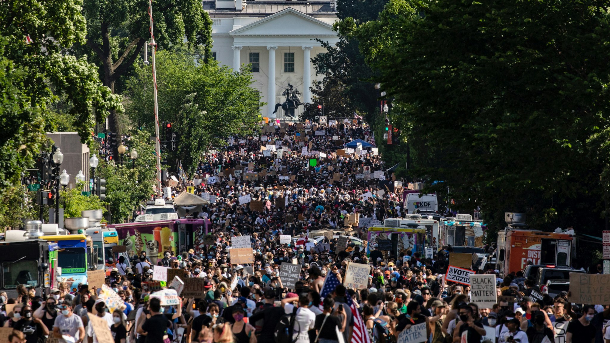 Protesters stretch for more than five blocks, from Scott Circle NW to H Street NW, during demonstrations over the death of George Floyd near the White House on June 6, 2020 in Washington, DC.