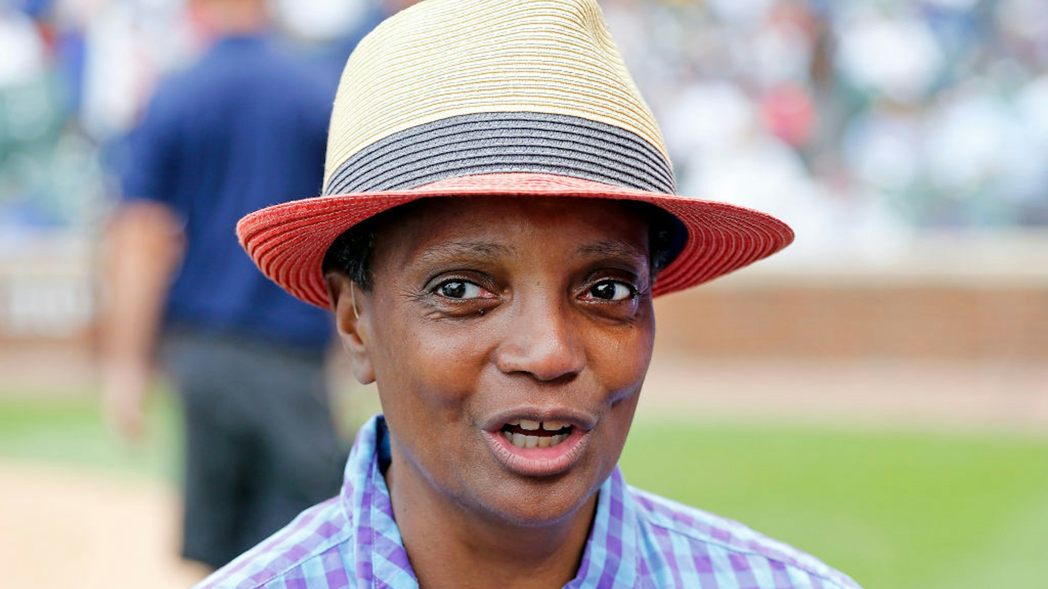 Chicago mayor Lori Lightfoot stands on the field during a ceremony honoring Lee Smith's induction into the Baseball Hall of Fame prior to a game between the Chicago Cubs and the Milwaukee Brewers at Wrigley Field on September 01, 2019 in Chicago, Illinois.