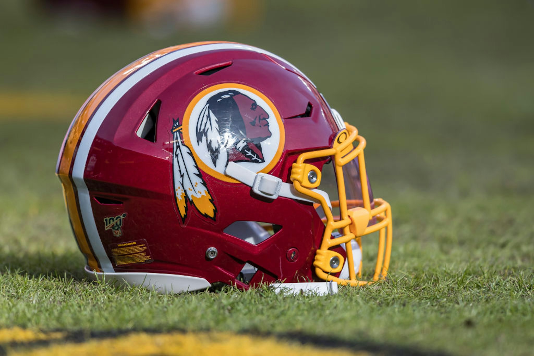 A Washington Redskins helmet is seen on the field before the game between the Washington Redskins and the New York Giants at FedExField on December 22, 2019 in Landover, Maryland.