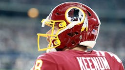Washington Redskins Case Keenum #8 of the Washington Redskins waits to go on the field against the Dallas Cowboys at AT&T Stadium on December 29, 2019 in Arlington, Texas.