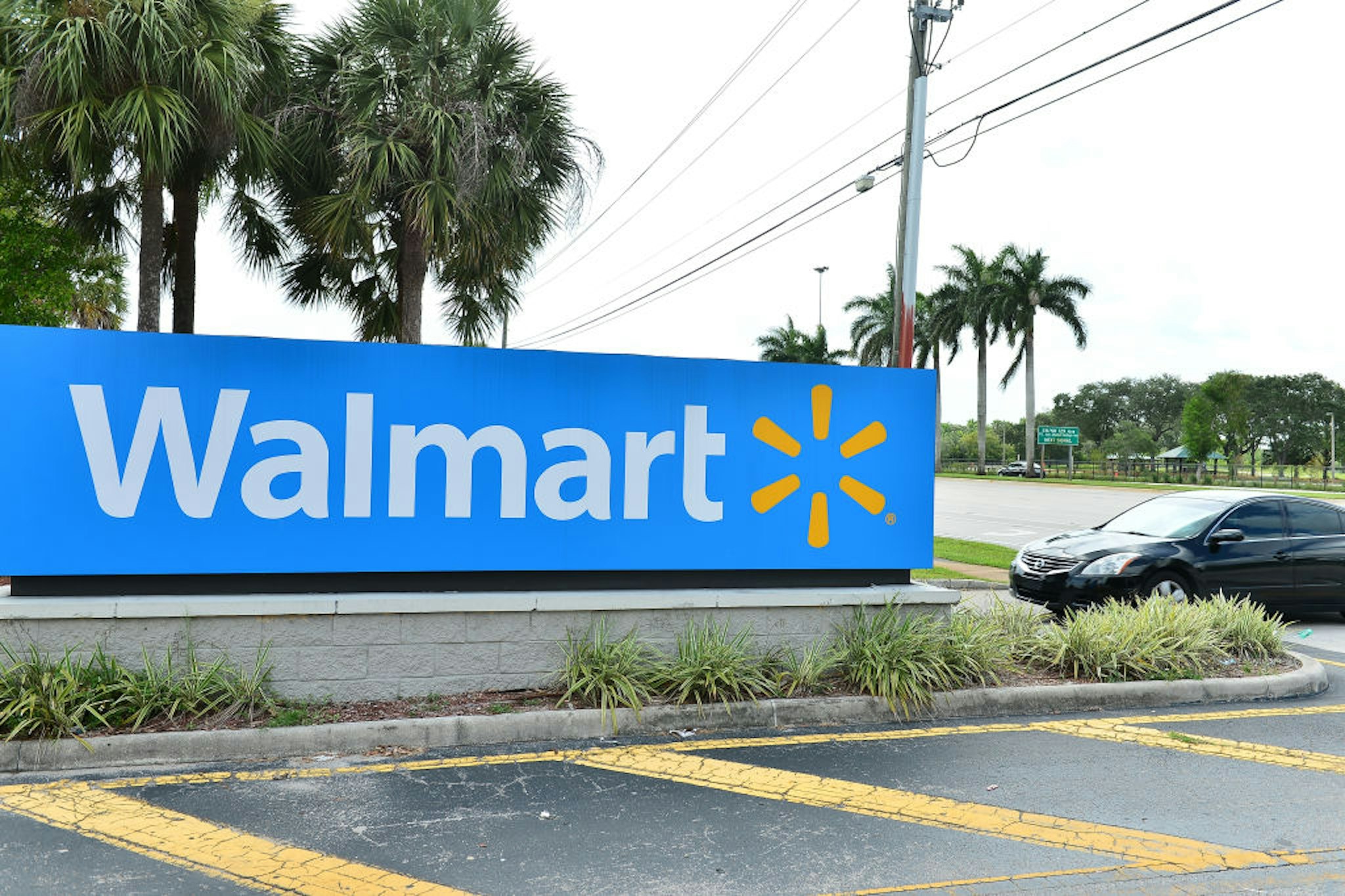 A view outside a Walmart retail store is seen on July 16, 2020 in Pembroke Pines, Florida. Some major U.S. corporations are requiring masks to be worn in their stores upon entering to control the spread of COVID-19.