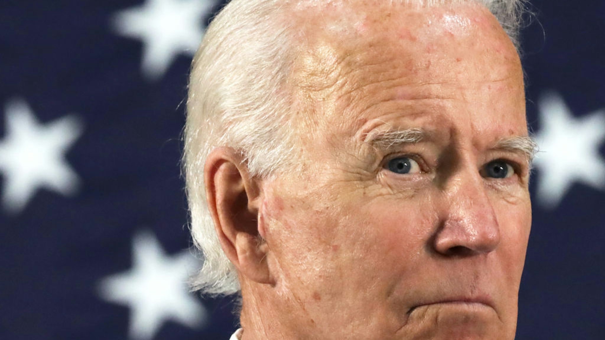 Democratic presidential candidate, former Vice President Joe Biden listens during a campaign event June 30, 2020 at Alexis I. Dupont High School in Wilmington, Delaware.