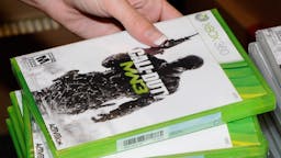 modern warfare NORTH LAS VEGAS, NV - NOVEMBER 08: GameStop employee Randi Taber rings up copies of "Call of Duty: Modern Warfare 3" for the Xbox 360 during a launch event for the highly anticipated video game at a GameStop Corp. store November 8, 2011 in North Las Vegas, Nevada. Video game publisher Activision released the eighth installment in the "Call of Duty" franchise at midnight. (Photo by Ethan Miller/Getty Images)