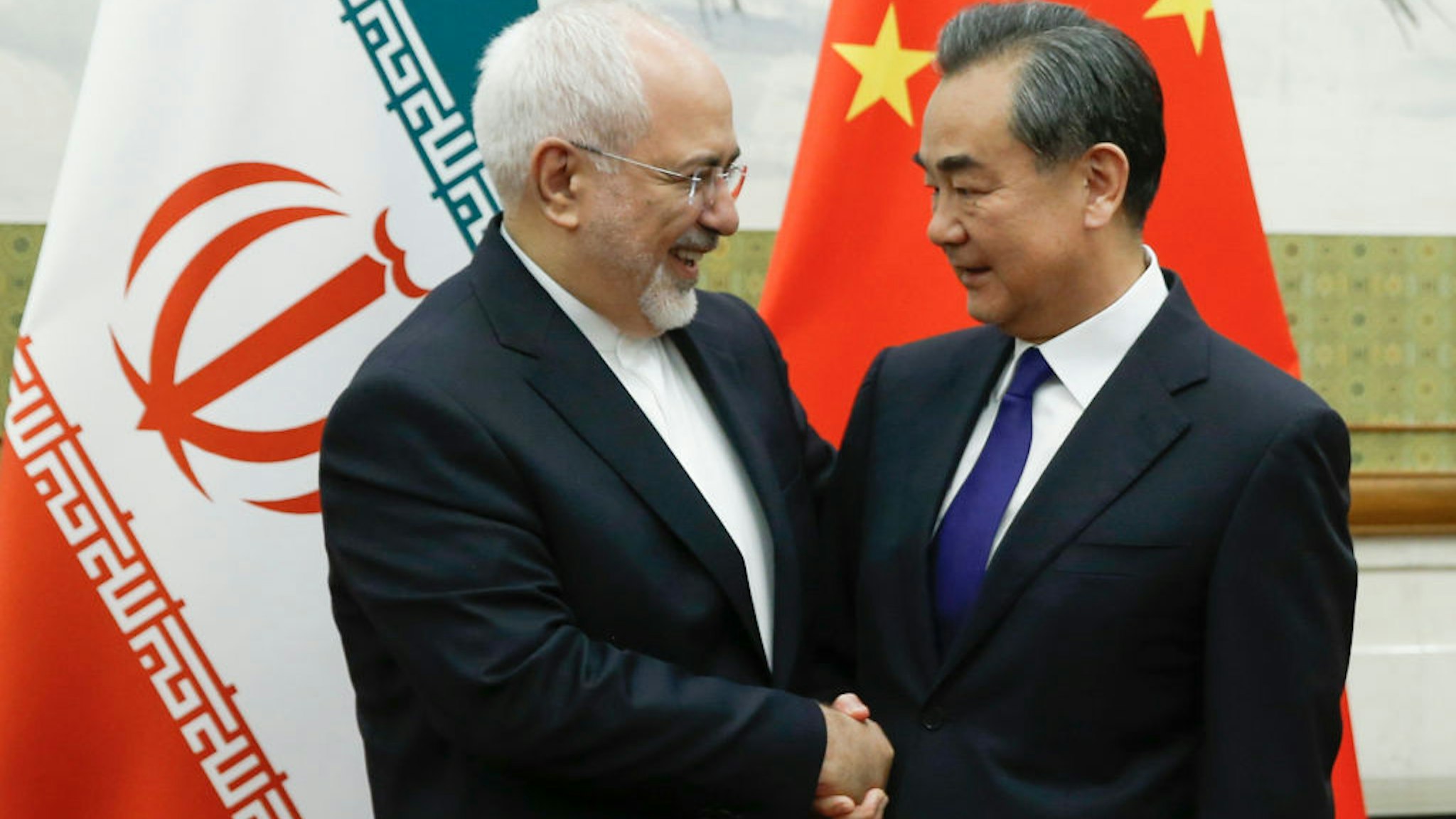 Chinese State Councillor and Foreign Minister Wang Yi meets Iranian Foreign Minister Mohammad Javad Zarif at Diaoyutai state guesthouse on May 13, 2018 in Beijing, China.