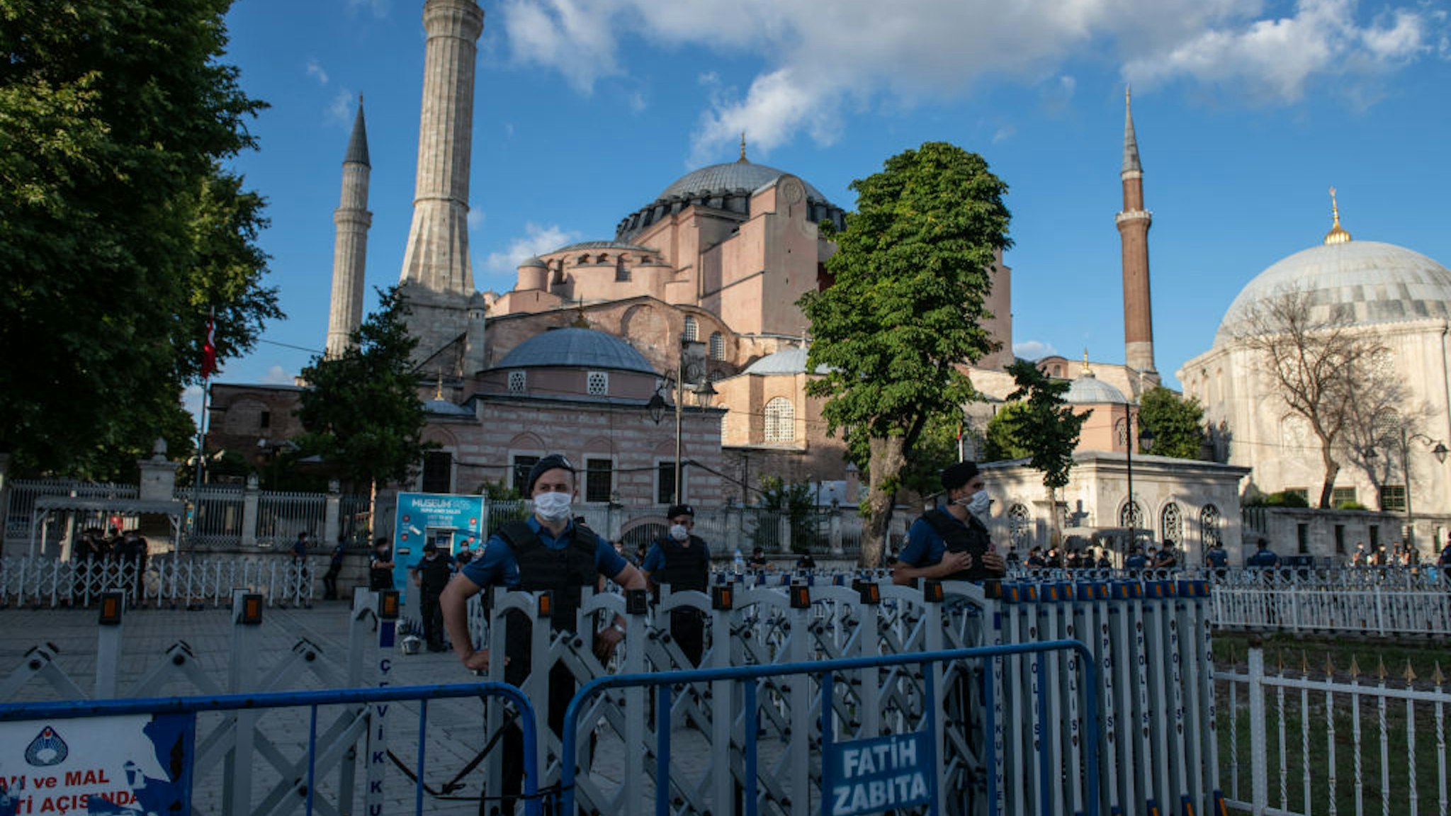 ISTANBUL, TURKEY - JULY 10: Police officers stand guard outside Istanbul's famous Hagia Sophia on July 10, 2020 in Istanbul, Turkey. Turkey's top administrative court ruled to annul a 1934 decree that turned the historic Hagia Sophia into a museum. The controversial ruling opens the way for the structure to be converted back into a mosque after 85 years. President Recep Tayyip Erdoğan handed over the iconic structure’s control to the country’s Religious Affairs Directorate following a court ruling revoking its status as a museum. President Erdogan said that the government will open Istanbul’s Hagia Sophia for worship on July 24. (Photo by Burak Kara/Getty Images)