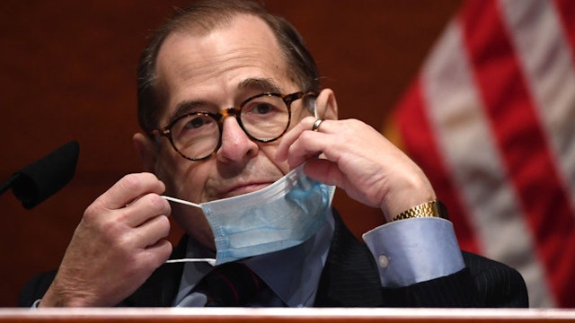 House Judiciary Committee Chairman Jerry Nadler (D-NY) adjusts his mask as he presides over the House Judiciary Committee markup of H.R. 7120, the "George Floyd Justice in Policing Act of 2020," on Capitol Hill on June 17, 2020 in Washington, DC. The bill addresses police reforms in the United States and includes provisions to curb police misconduct and the use of excessive force. (Photo by Kevin Dietsch-Pool/Getty Images)