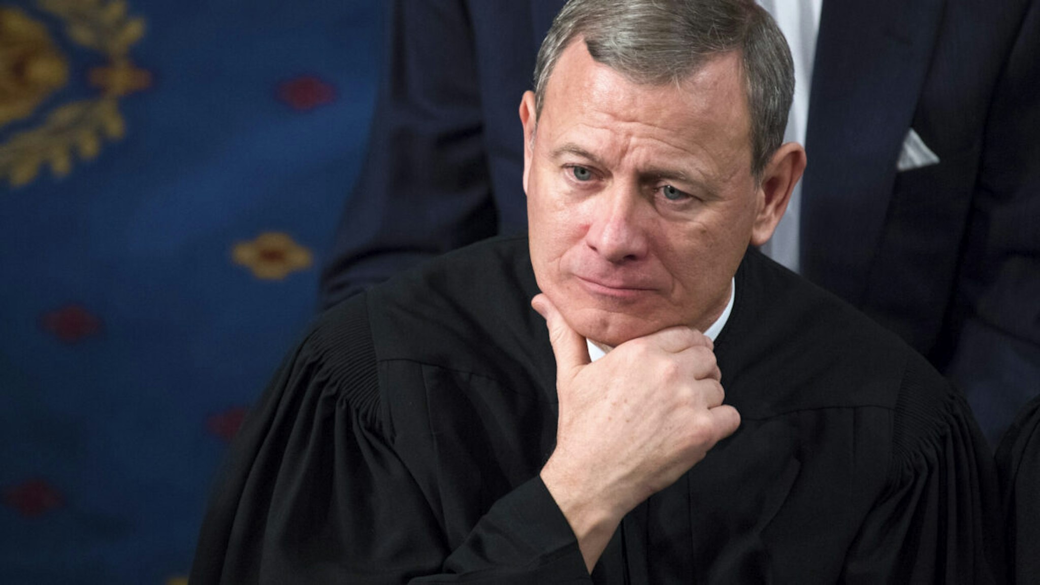 UNITED STATES - JANUARY 30: Supreme Court Chief Justice John Roberts listens to President Donald Trump's State of the Union address to a joint session of Congress on January 30, 2018.