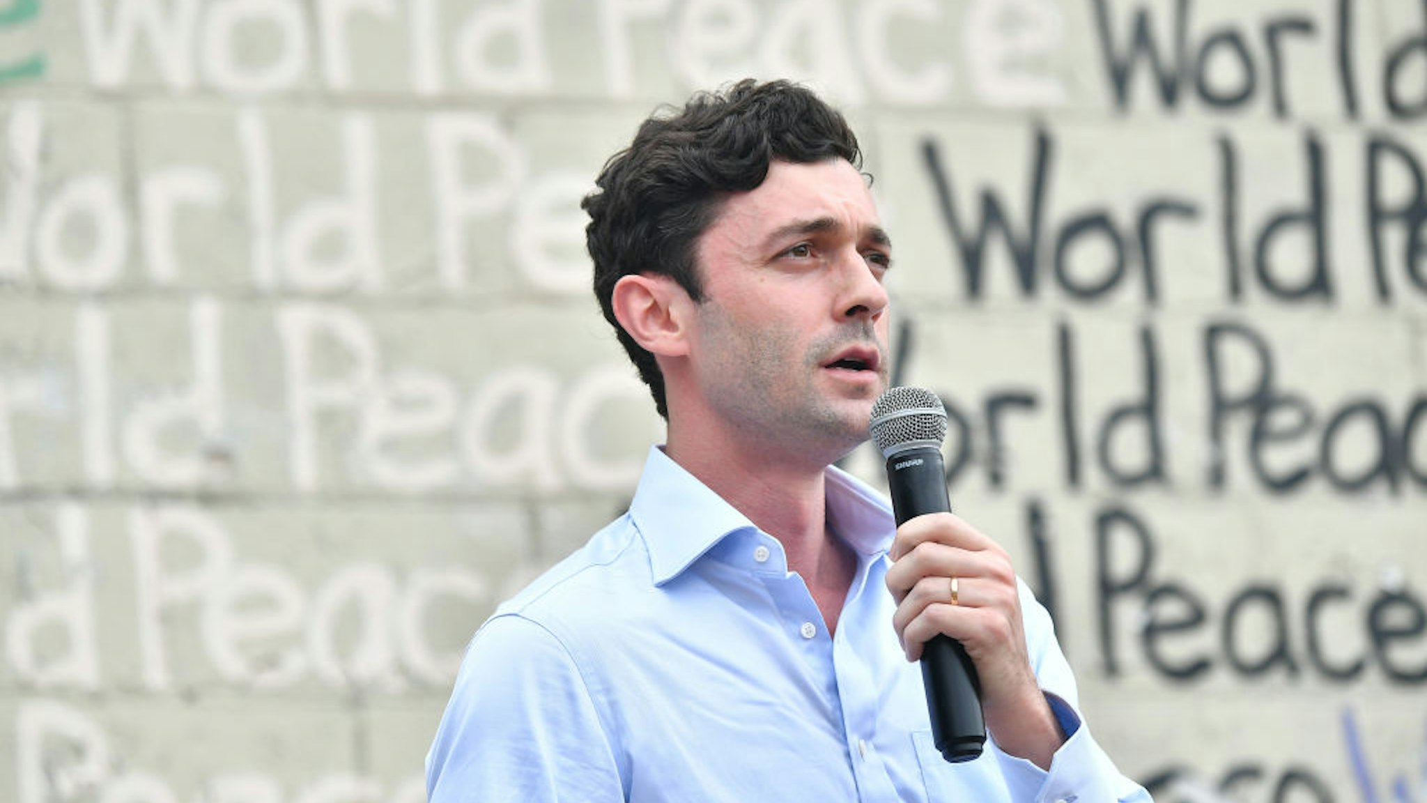 ATLANTA, GEORGIA - JUNE 19: US Senate candidate Jon Ossoff speaks onstage during Juneteenth Voter Registration Concert &amp; Rally at Murphy Park Fairgrounds on June 19, 2020 in Atlanta, Georgia. (Photo by Paras Griffin/Getty Images,)