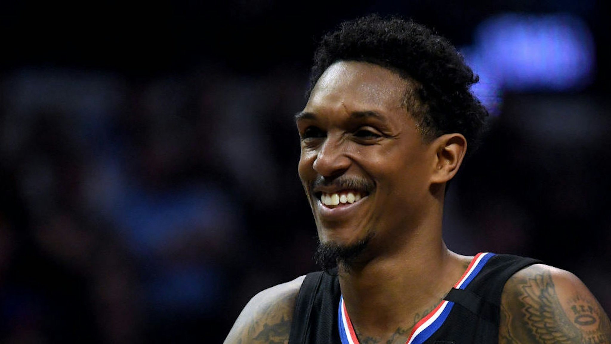 LOS ANGELES, CALIFORNIA - FEBRUARY 28: Lou Williams #23 of the LA Clippers smiles during a timeout in the game against the Denver Nuggets at Staples Center on February 28, 2020 in Los Angeles, California. (Photo by Harry How/Getty Images)