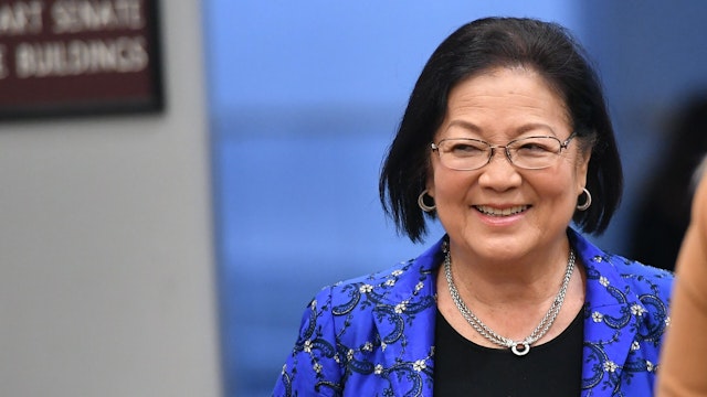 Senator Mazie Hirono(L) (D-HI) arrives during the impeachment trial of US President Donald Trump on Capitol Hill January 29, 2020, in Washington, DC. - The fight over calling witnesses to testify in President Donald Trump's impeachment trial intensified January 28, 2020 after Trump's lawyers closed their defense calling the abuse of power charges against him politically motivated. Democrats sought to have the Senate subpoena former White House national security advisor John Bolton to provide evidence after leaks from his forthcoming book suggested he could supply damning evidence against Trump.