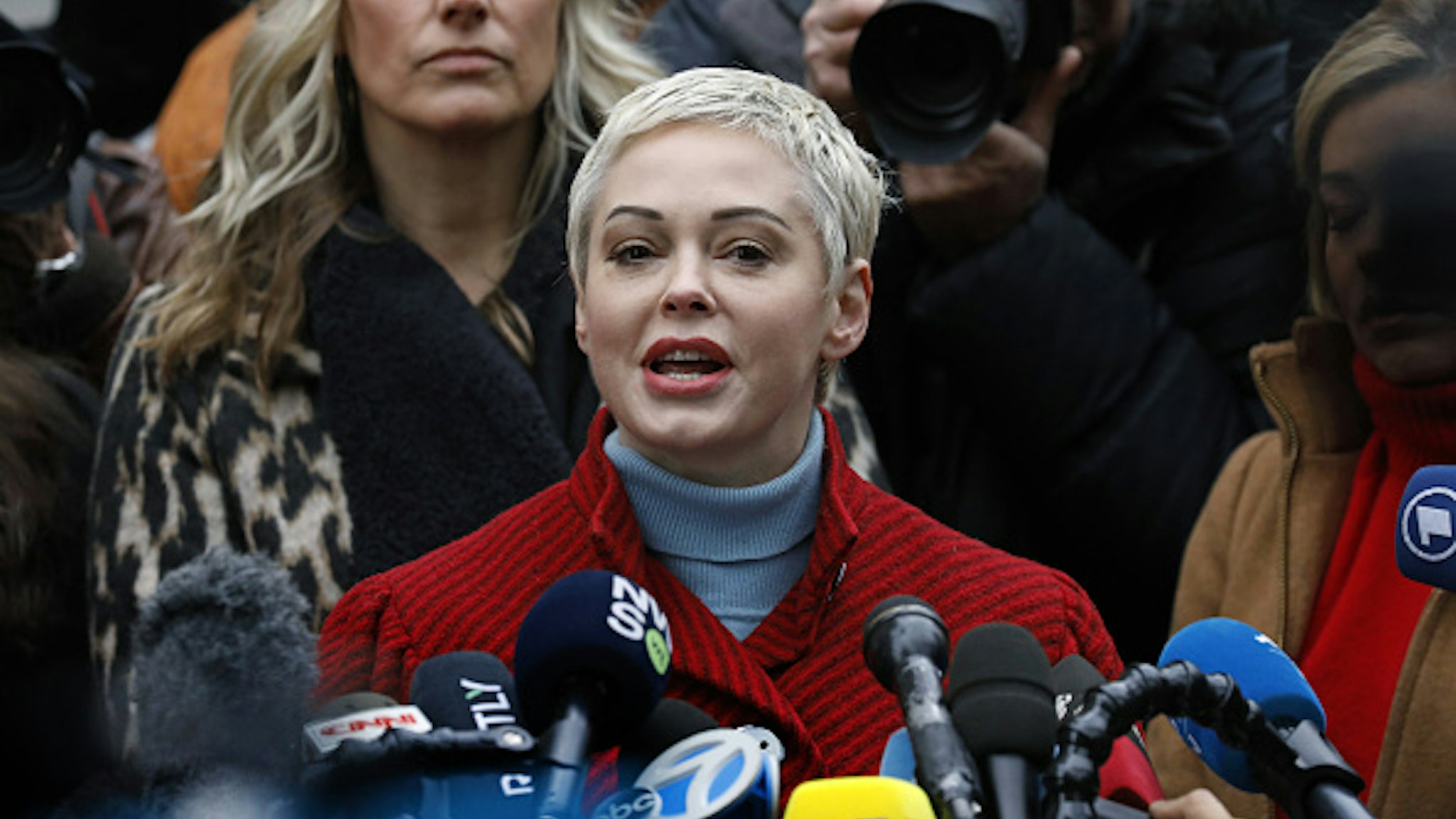 Actress Rose McGowan speaks with members of the media after former Weinstein Co. Co-Chairman Harvey Weinstein arrives at state supreme court in New York, U.S., Monday, Jan. 6, 2020. Weinstein's criminal trial, on five felony counts, including predatory sexual assault and rape, is scheduled to begin on Monday in state court in Manhattan. Jury selection could last two weeks, the trial six more.