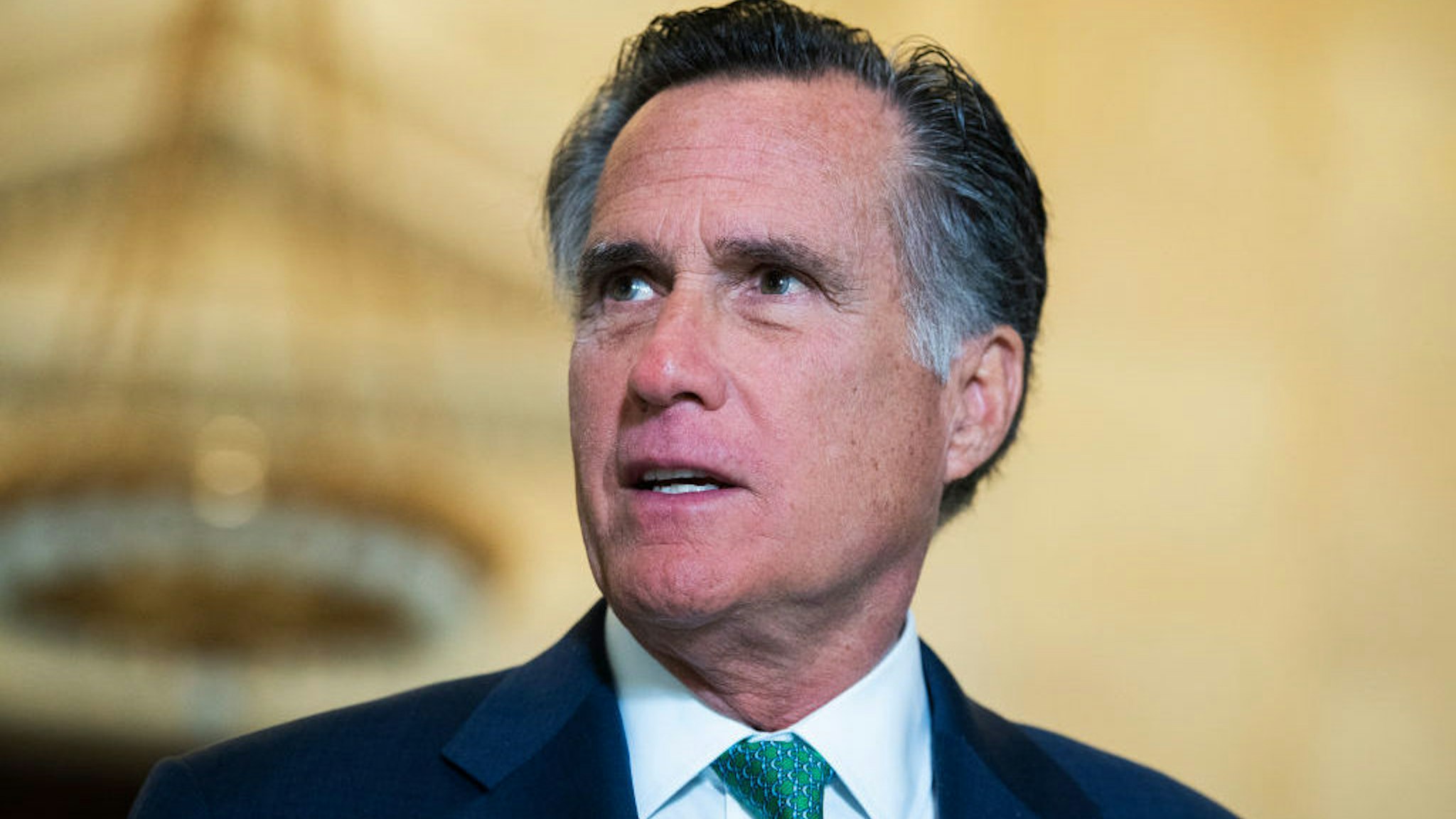UNITED STATES - MARCH 17: Sen. Mitt Romney, R-Utah, leaves the Senate Republican Policy luncheon in Russell Building on Tuesday, March 17, 2020. Treasury Secretary Steven Mnuchin attended to discuss the coronavirus relief package. (Photo By Tom Williams/CQ Roll Call)