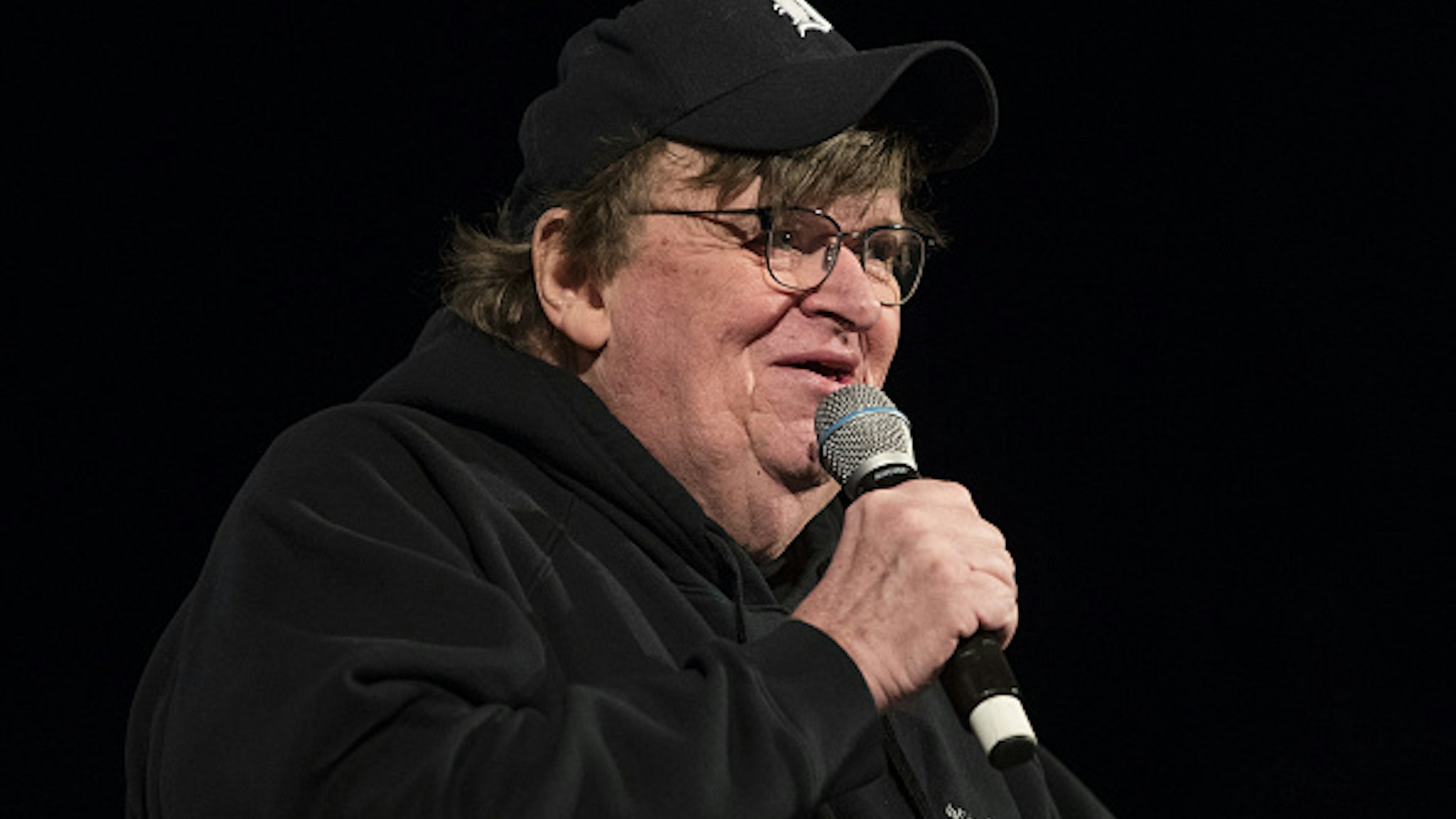 Michael Moore, American filmmaker, speaks during a campaign event for Senator Bernie Sanders, an Independent from Vermont and 2020 presidential candidate, during a town hall event in Rochester, New Hampshire, U.S., on Saturday, Feb. 8, 2020. Sanders is favored to win New Hampshire, but recent polls showed Pete Buttigieg cutting into his lead.