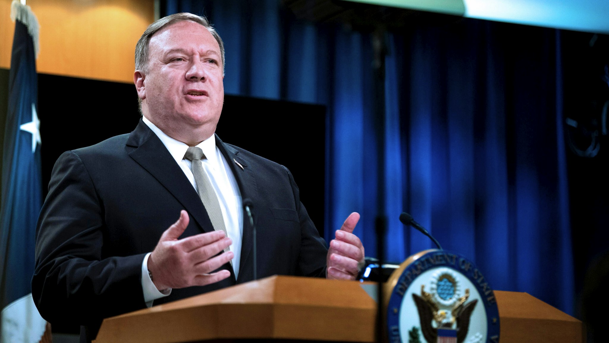 US Secretary of State Mike Pompeo, speaks during a news conference at the State Department,on July 1, 2020, in Washington, DC. - Secretary of State Mike Pompeo on Wednesday left the door open to President Vladimir Putin attending a US summit but insisted the administration has been firm over Moscow's activities in Afghanistan. President Donald Trump "gets to decide if he wants him to come to a summit or not. That's his decision," Pompeo told reporters.