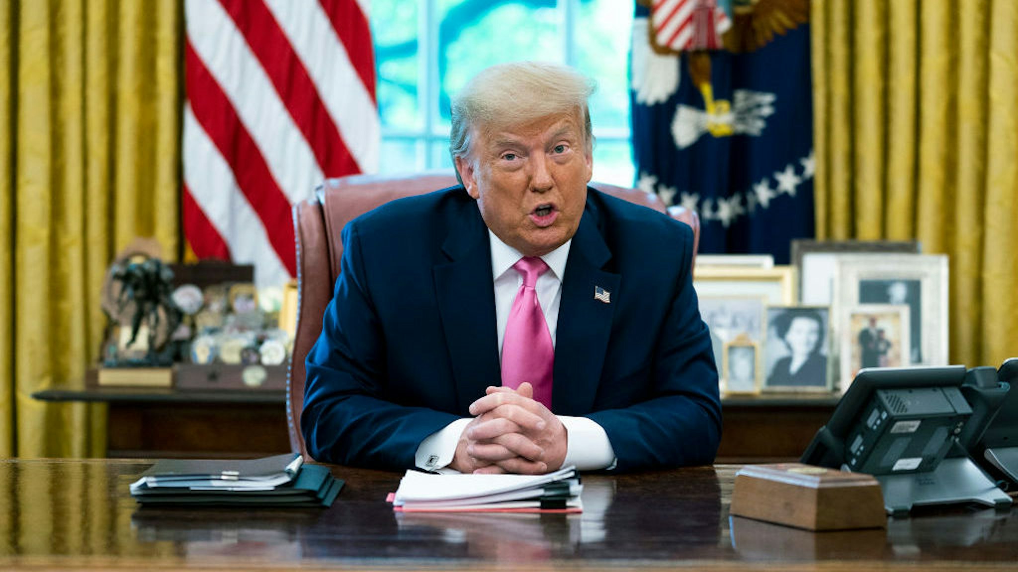 NYTUNREST - President Donald Trump makes remarks and he meets with GOP members of Congress and members of his cabinet in the Oval Office, Monday, July 20, 2020. ( Photo by Doug Mills/The New York Times)