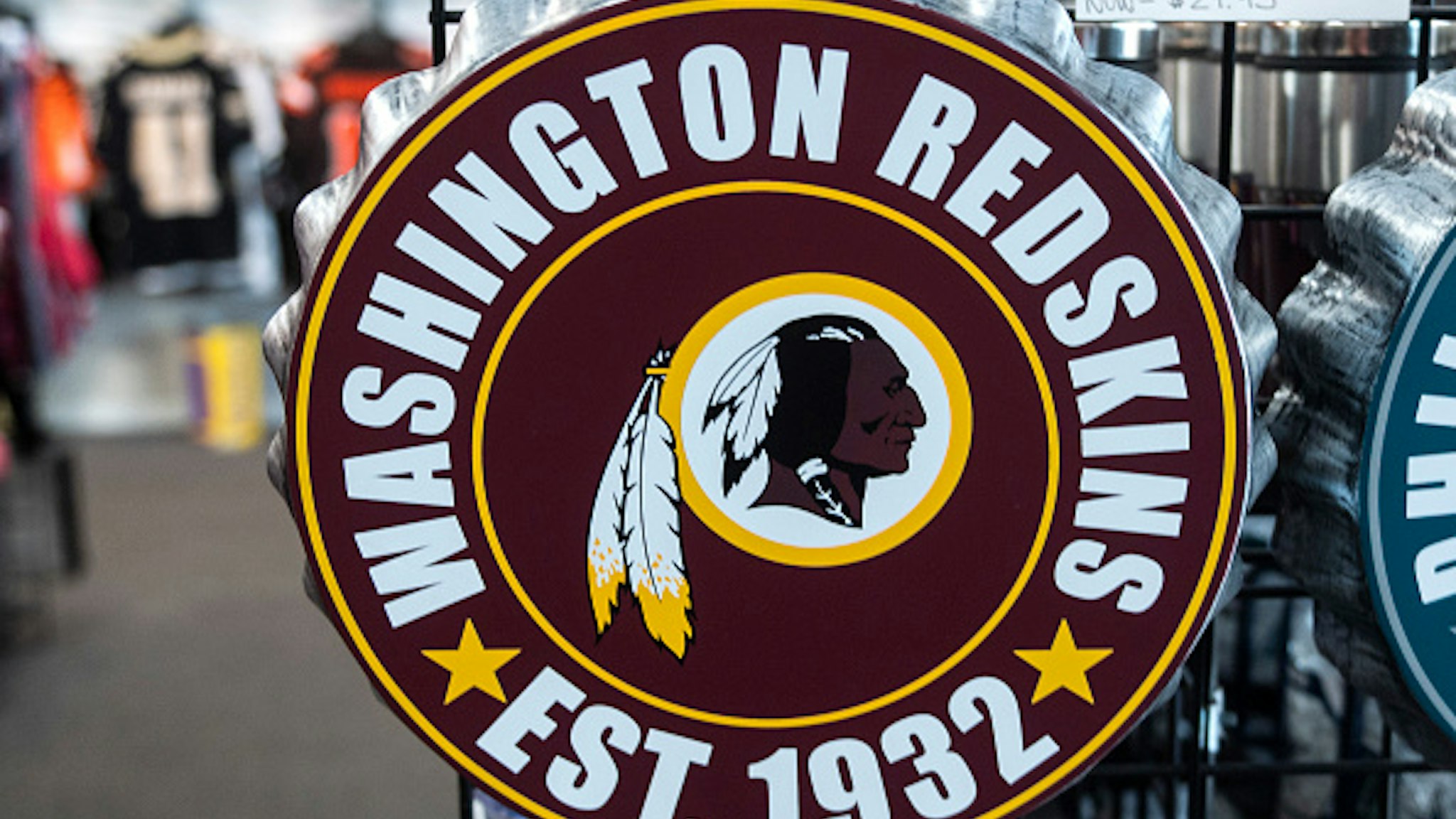 Washington Redskins merchandise is seen for sale at a sports store in Fairfax, Virginia on July 13, 2020. - The Washington Redskins confirmed on July 13 that the team is changing its name following pressure from sponsors over a word widely criticized as a racist slur against Native Americans.