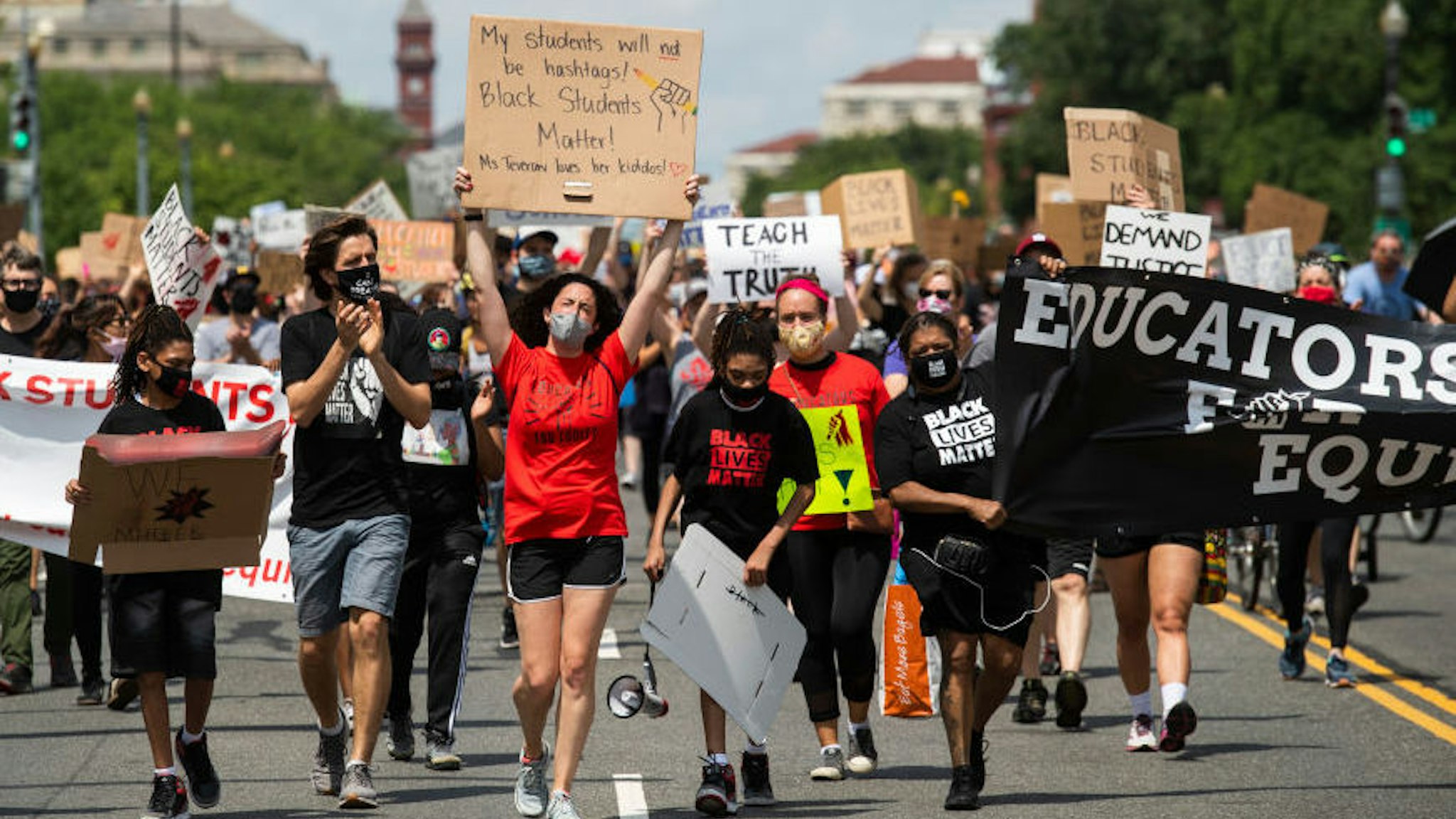Black Students Matter demonstrators march on Independence Avenue en route to a rally at the Department of Education as part of Juneteenth, a celebration to mark the end of slavery in the U.S., on Friday, June 19, 2020. (Photo By Tom Williams/CQ-Roll Call, Inc via Getty Images)