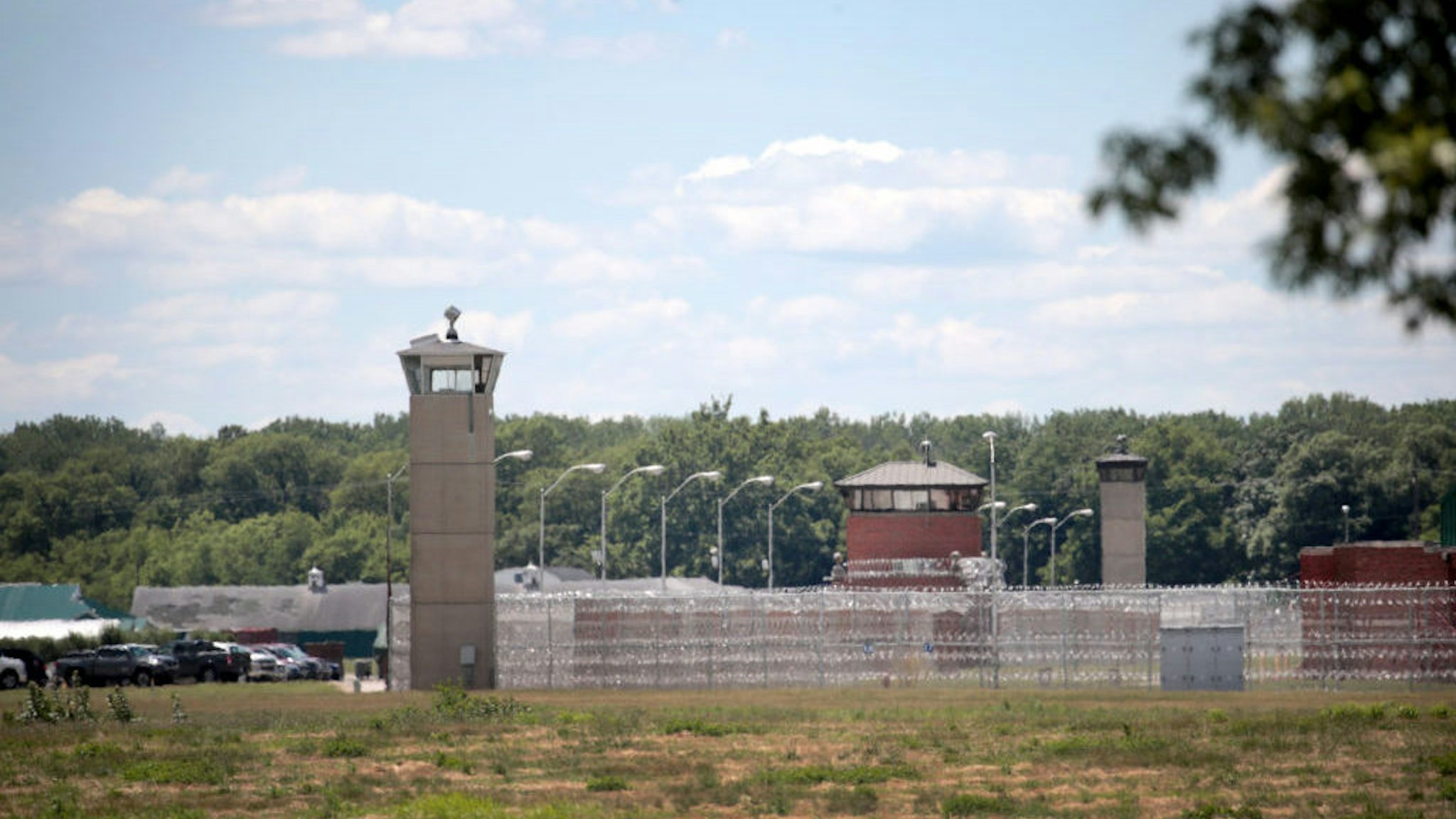 TERRE HAUTE, INDIANA - JULY 13: A guard tower sits along a security fence at the Federal Correctional Complex where Daniel Lewis Lee is scheduled to be executed on July 13, 2020 in Terre Haute, Indiana. Lee was convicted and sentenced to die for the 1996 killings in Arkansas of gun dealer William Mueller, his wife Nancy, and her 8-year-old daughter Sarah. He is scheduled to be the first federal prisoner put to death since 2003. (Photo by Scott Olson/Getty Images)