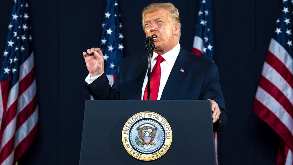 U.S. President Donald Trump speaks during an event at Mount Rushmore National Memorial in Keystone, South Dakota, U.S., on Friday, July 3, 2020. The early Independence Day celebration, which will feature a military flyover and the first fireworks in more than a decade, is expected to include about 7,500 ticketed guests who won't be required to wear masks or socially distance despite a spike in U.S. coronavirus cases.