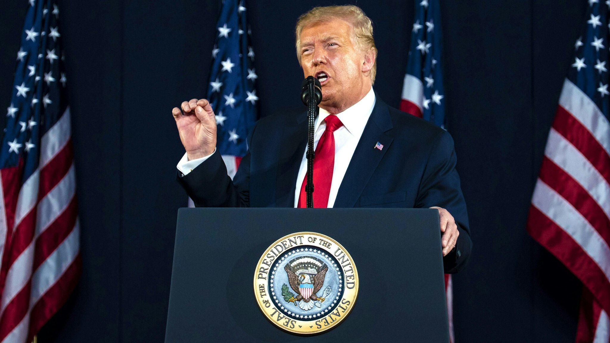 U.S. President Donald Trump speaks during an event at Mount Rushmore National Memorial in Keystone, South Dakota, U.S., on Friday, July 3, 2020. The early Independence Day celebration, which will feature a military flyover and the first fireworks in more than a decade, is expected to include about 7,500 ticketed guests who won't be required to wear masks or socially distance despite a spike in U.S. coronavirus cases.