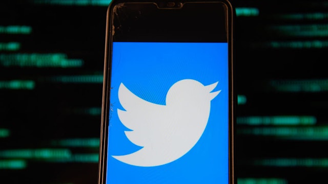 POLAND - 2020/07/15: In this photo illustration a Twitter logo is seen displayed on a smartphone.