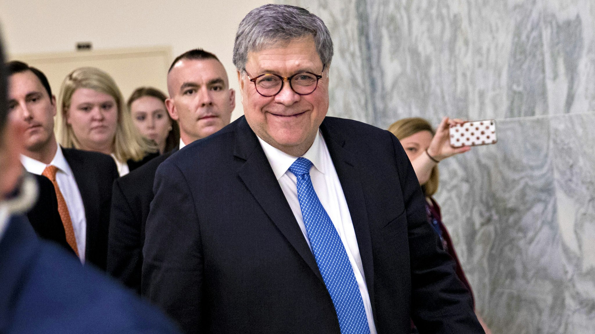FILE: William Barr, U.S. attorney general, exits after a House Appropriations Subcommittee hearing in Washington, D.C., U.S., on Tuesday, April 9, 2019. Monday, January 20, 2020, marks the third anniversary of U.S. President Donald Trump's inauguration. Our editors select the best archive images looking back over Trumps term in office.