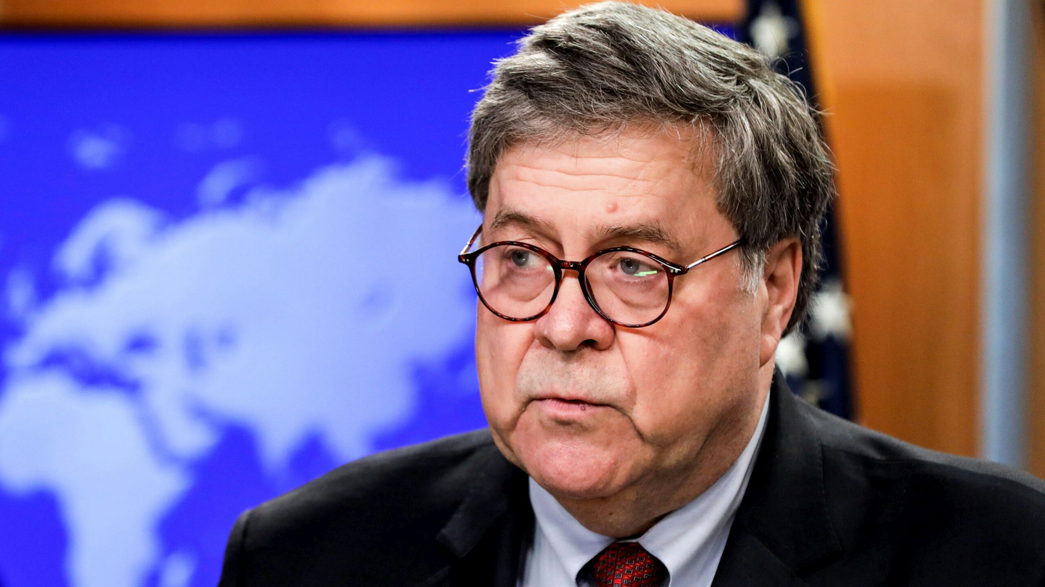 US Attorney General William Barr speaks at a joint news conference on the International Criminal Court, at the State Department in Washington, DC, on June 11, 2020. - The US on Thursday accused Russia of "manipulating" the International Criminal Court as President Donald Trump announced sanctions against court officials who target US troops. "Foreign powers like Russia are also manipulating the ICC in pursuit of their own agenda," Barr said.