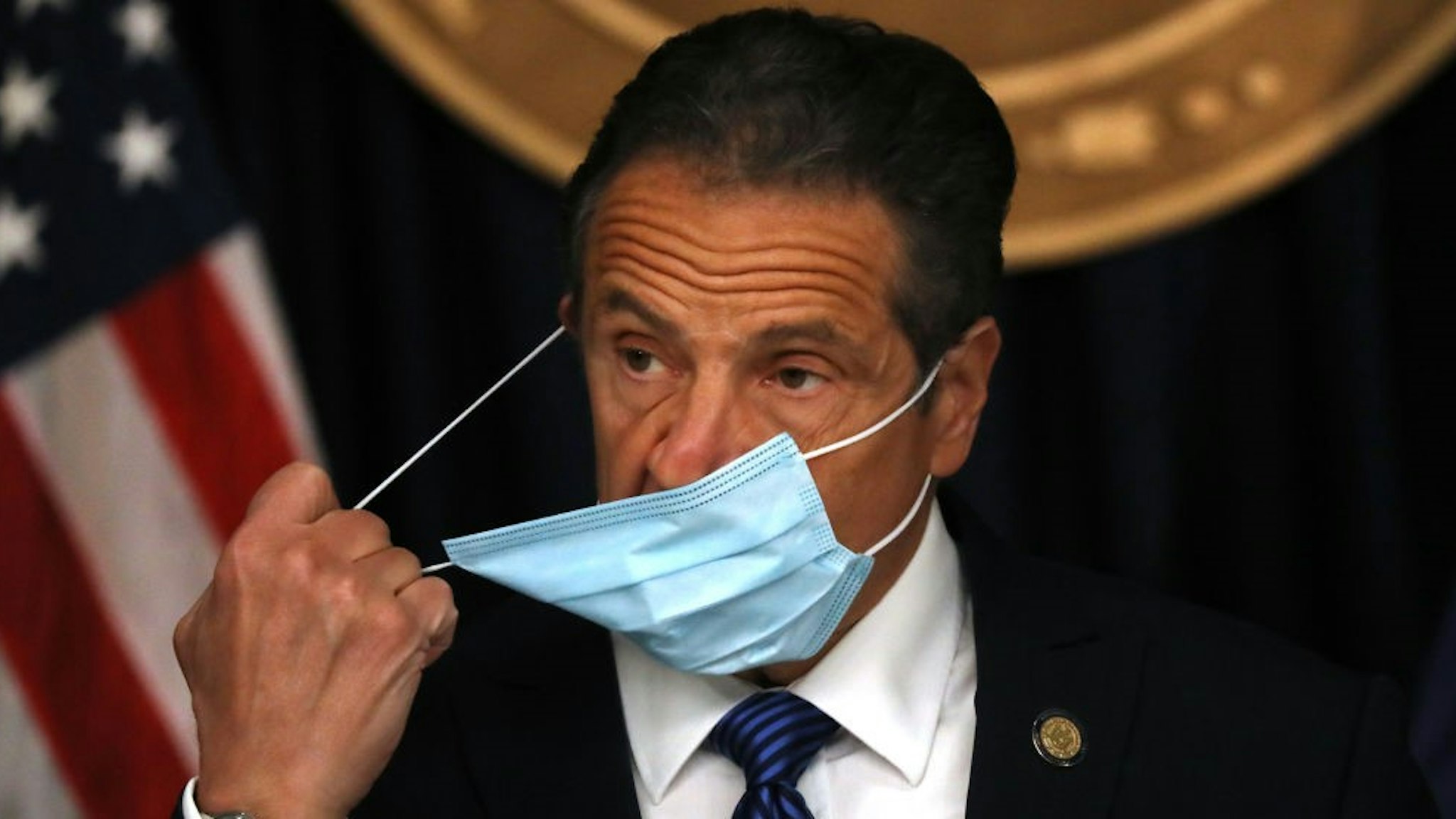 NEW YORK, NEW YORK - MAY 21: New York Governor Andrew Cuomo arrives with a face mask at a news conference on May 21, 2020 in New York City. While the governor continued to say that New York City is seeing a steady decline in coronavirus cases, he also mentioned that the number of countries reporting a mysterious illness in children believed to be connected to COVID-19 has nearly doubled in just one week. (Photo by