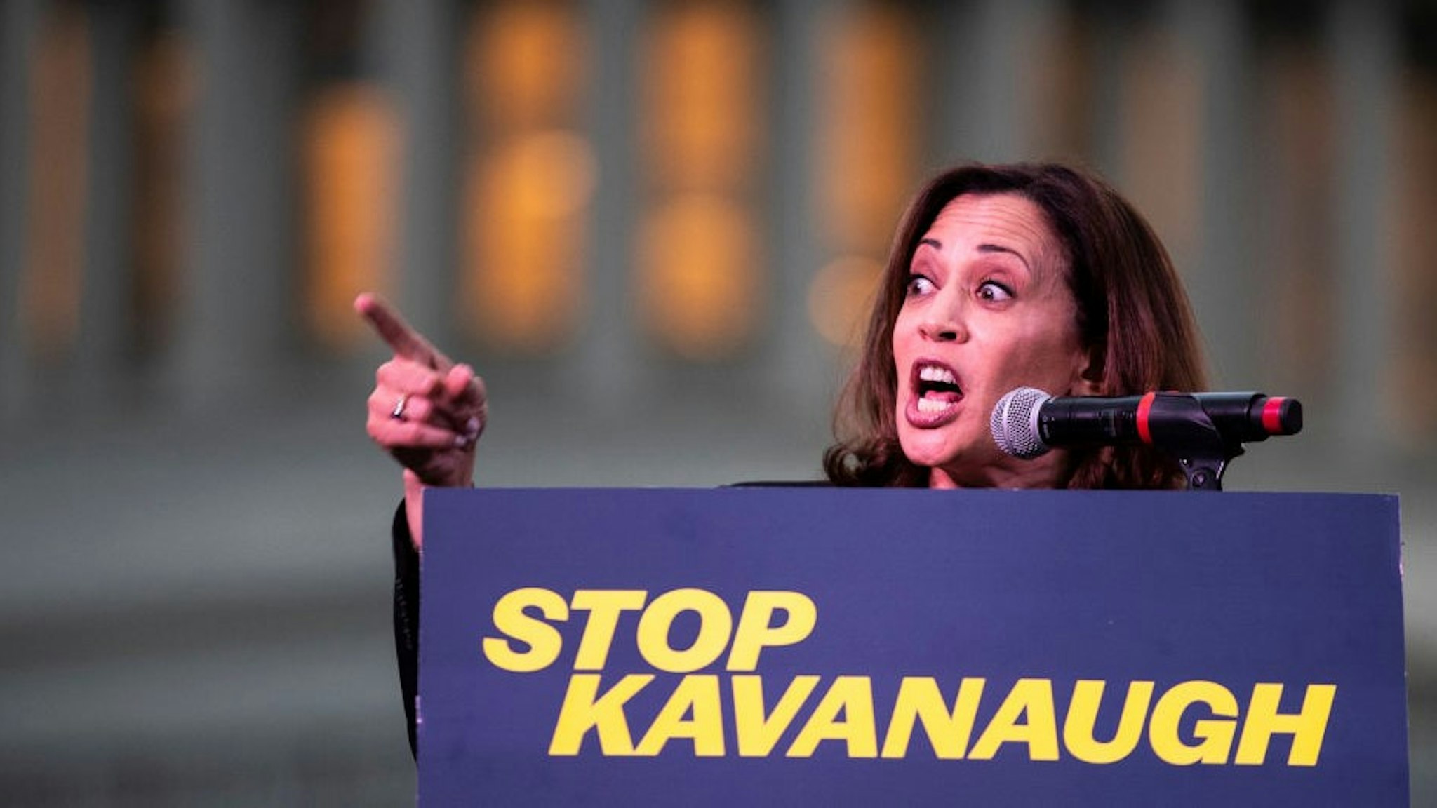WASHINGTON, DC - OCTOBER 4: U.S. Sen. Kamala Harris (D-CA) speaks to protestors rallying against Supreme Court nominee Judge Brett Kavanaugh on Capitol Hill, October 4, 2018 in Washington, DC. Kavanaugh's confirmation process was halted for less than a week so that FBI investigators could look into allegations by Dr. Christine Blasey Ford, a California professor who who has accused Kavanaugh of sexually assaulting her during a party in 1982 when they were high school students in suburban Maryland. (Photo by