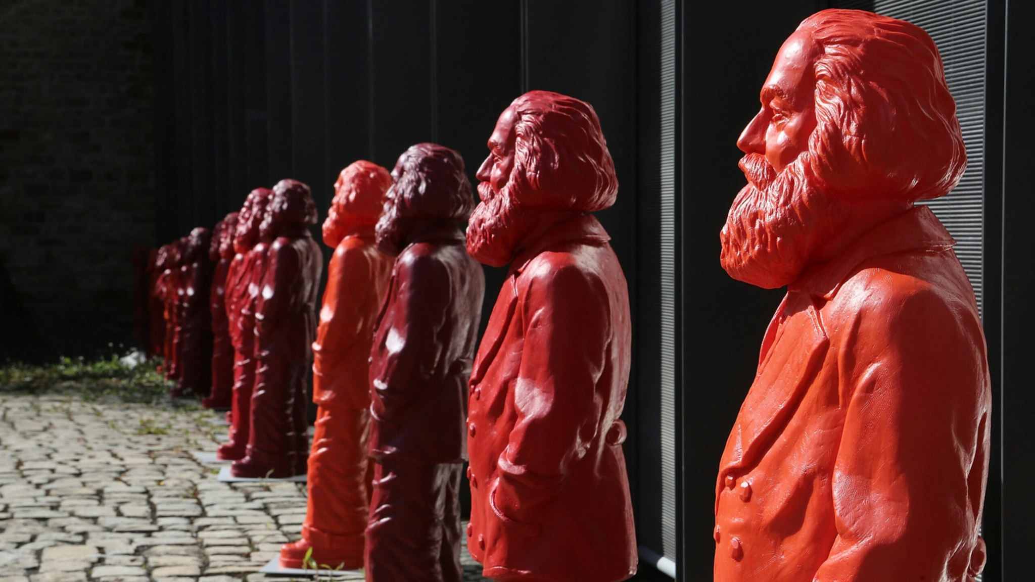 Some of the 500, one meter tall statues of German political thinker Karl Marx on display on May 5, 2013 in Trier, Germany.