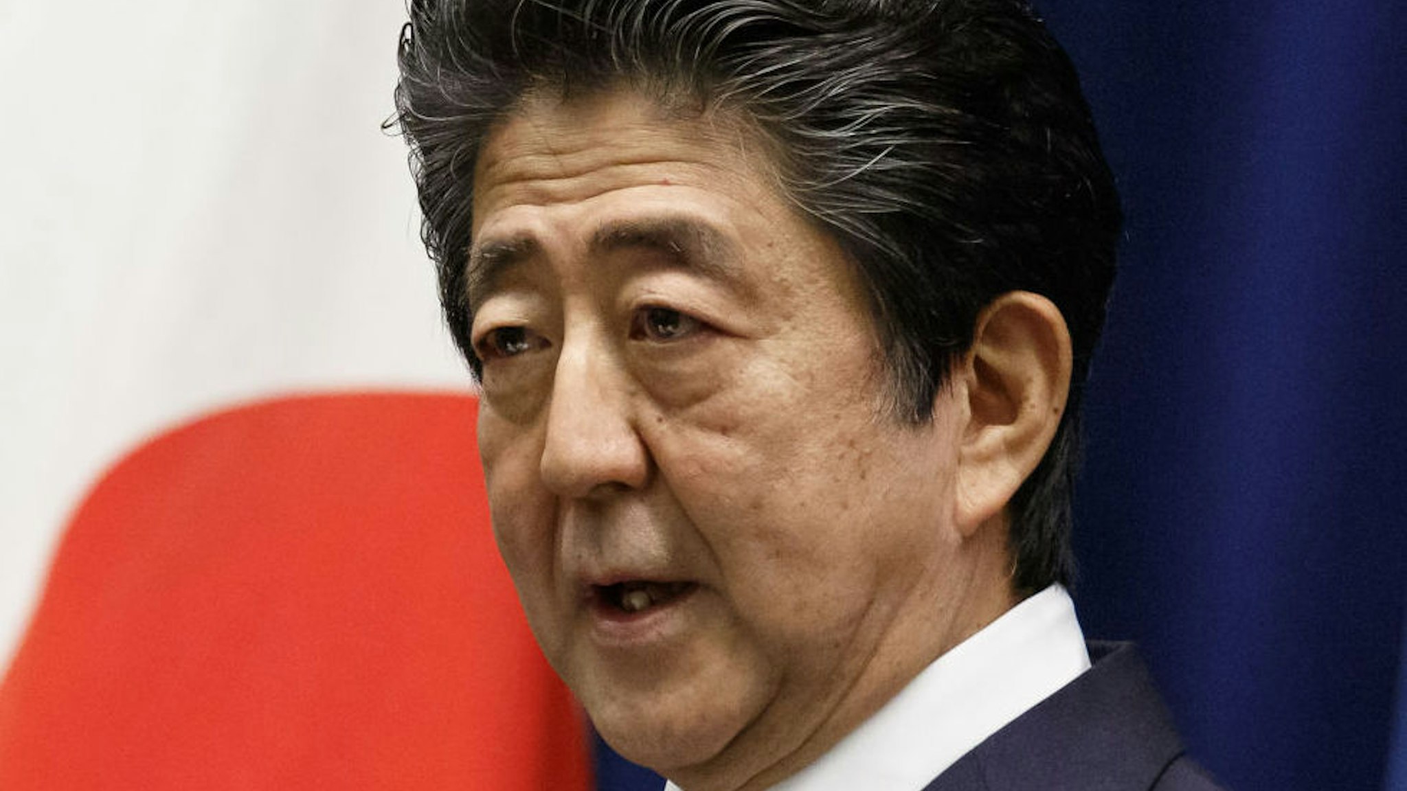 Shinzo Abe, Japan's prime minister, speaks during a news conference in Tokyo, Japan, on Thursday, June 18, 2020. The Japanese government will lift all domestic travel restrictions Friday as it looks to move into the next phase of reopening, including a restart of events and nightlife.