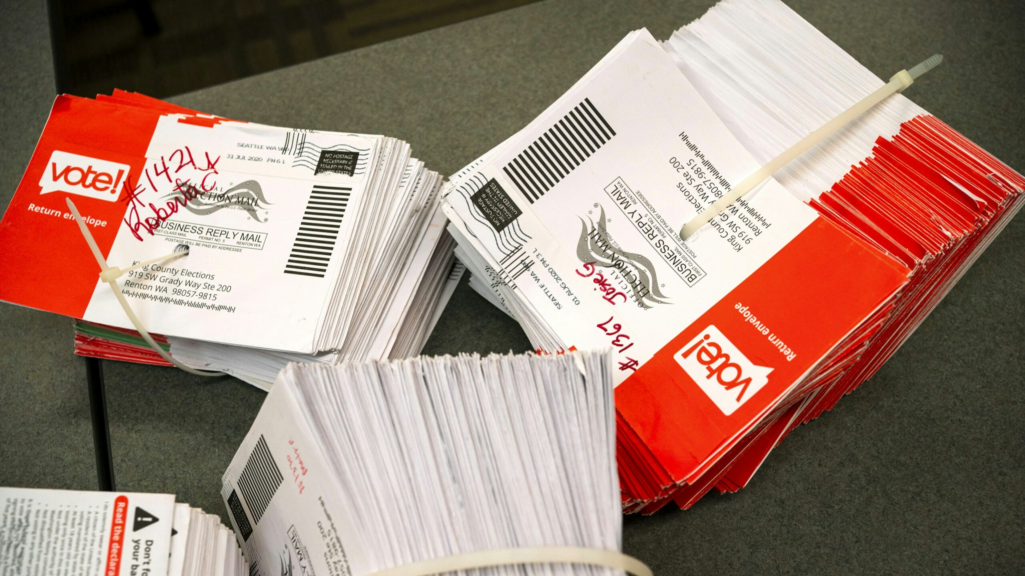 RENTON, WA - AUGUST 04: Opened ballot envelopes await storage at the King County Elections headquarters on August 4, 2020 in Renton, Washington. Today is election day for the primary in Washington state, where voting is done almost exclusively by mail.