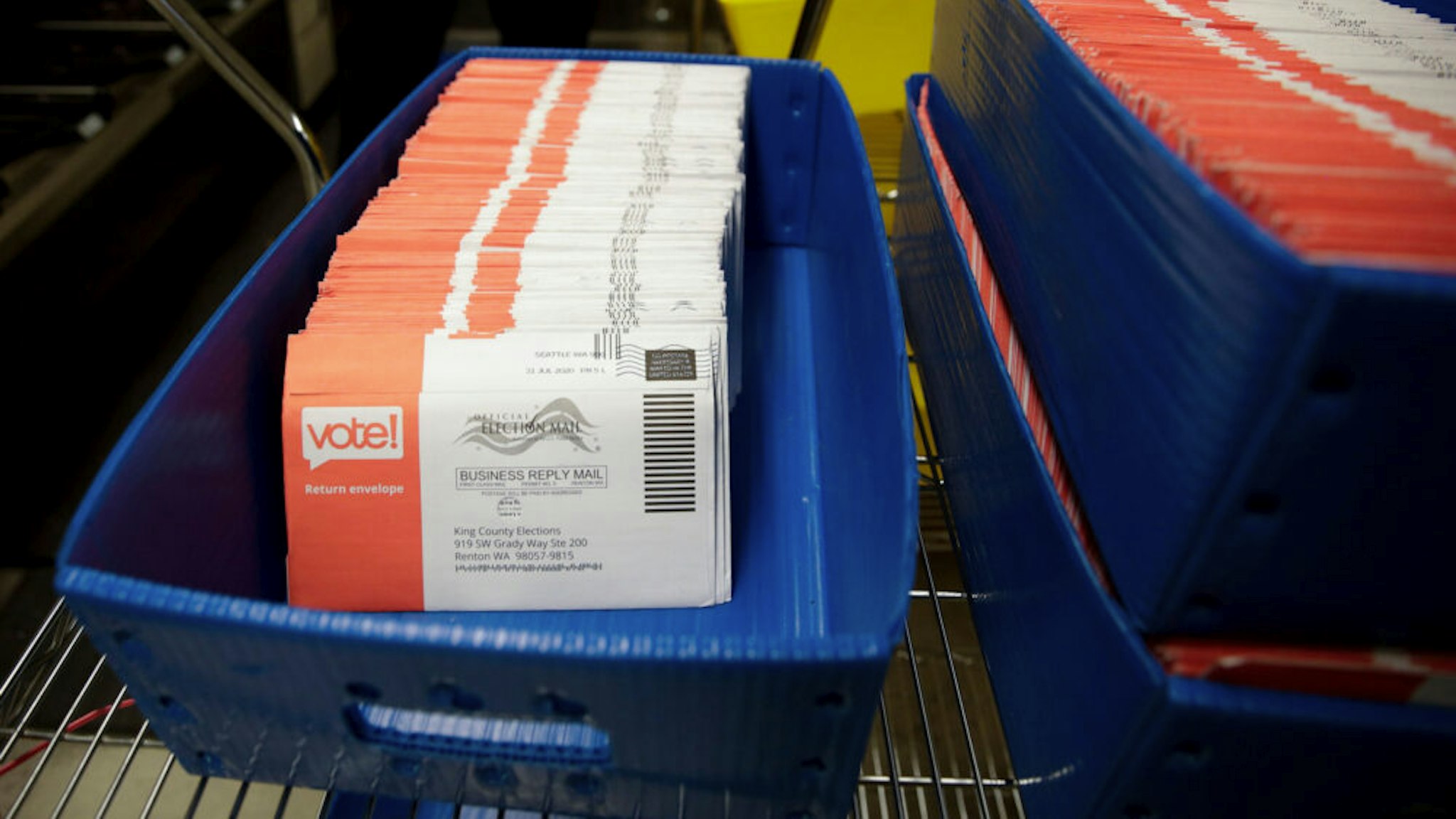 Vote-by-mail ballots for the August 4 Washington state primary are pictured at King County Elections in Renton, Washington on August 3, 2020.