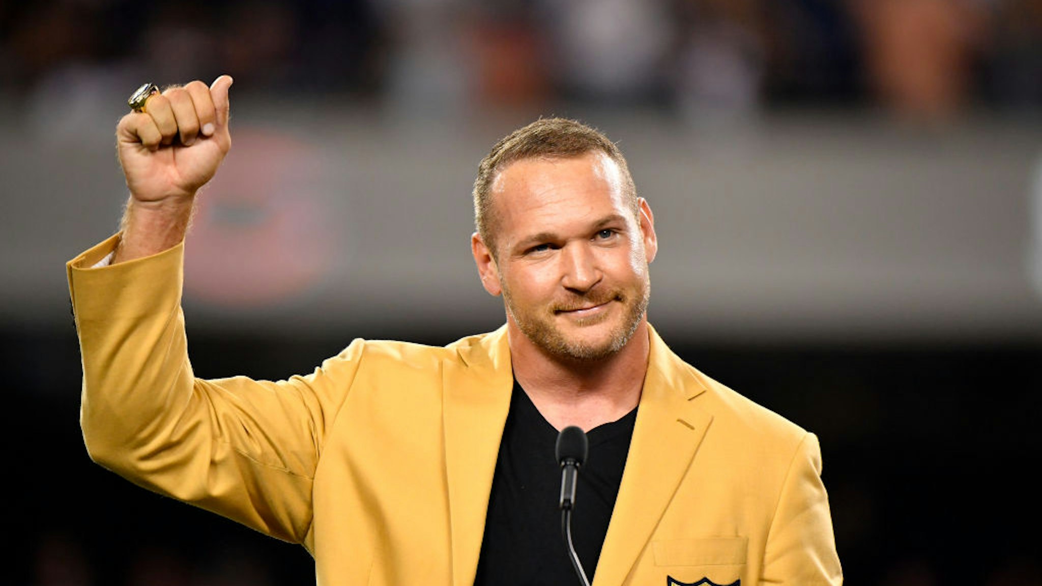 CHICAGO, IL - SEPTEMBER 17: Brian Urlacher is honored with a Ring of Excellence ceremony for his recent induction into the Hall of Fame at Soldier Field on September 17, 2018 in Chicago, Illinois. (Photo by Quinn Harris/Getty Images)
