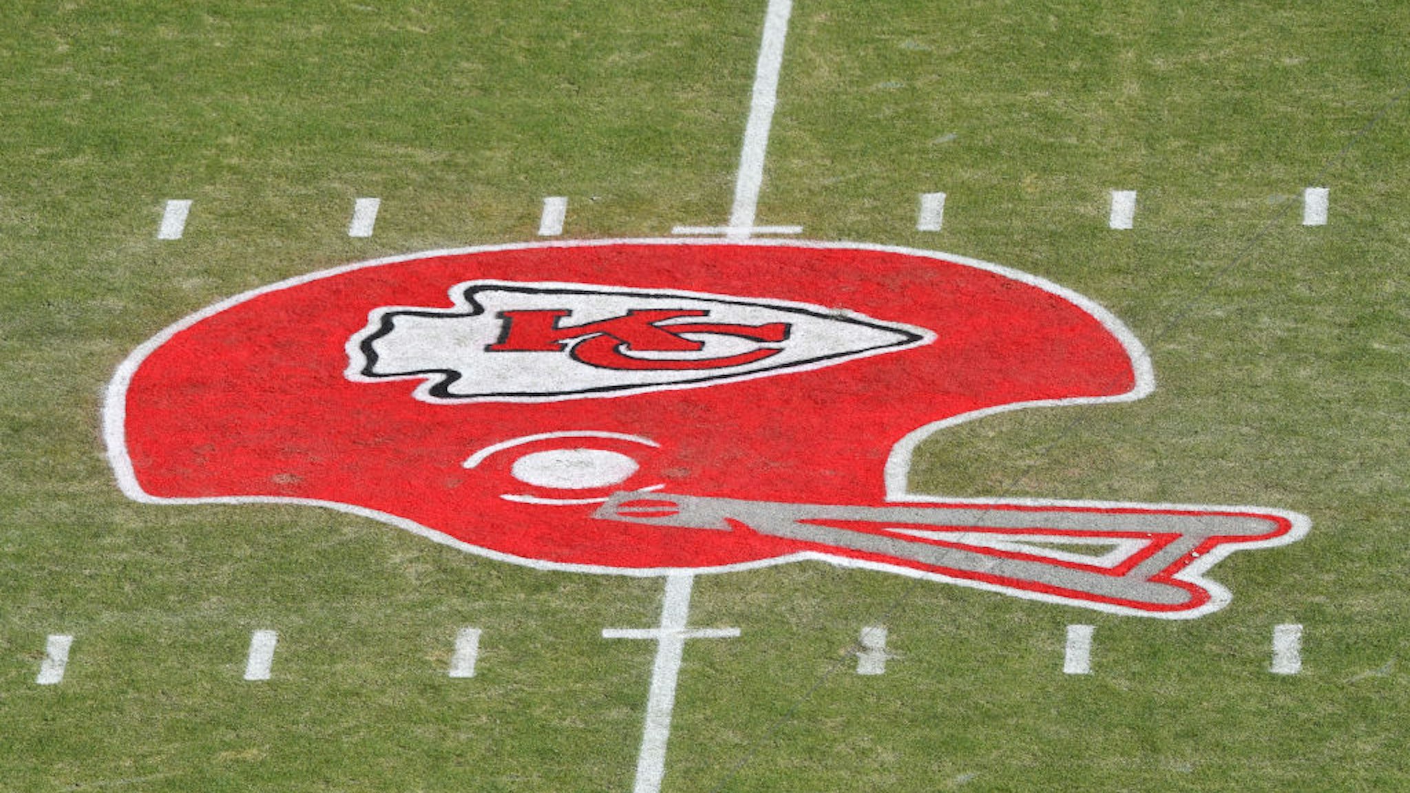 KANSAS CITY, MISSOURI - JANUARY 19: The Kansas City Chiefs helmet logo is seen on the field before the AFC Championship Game between the Kansas City Chiefs and the Tennessee Titans at Arrowhead Stadium on January 19, 2020 in Kansas City, Missouri.