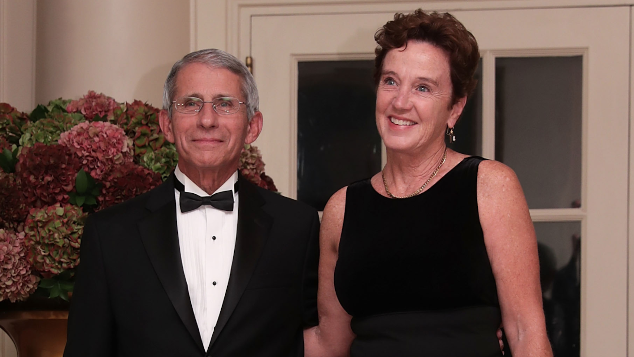 Director of the National Institute of Allergy & Infectious Diseases at the National Institute of Health Anthony Fauci and his wife Christine Grady arrive at the White House for a state dinner October 18, 2016 in Washington, DC. U.S. President Barack Obama is hosting a state dinner for Prime Minister of Italy Matteo Renzi and his wife Agnese Landini.