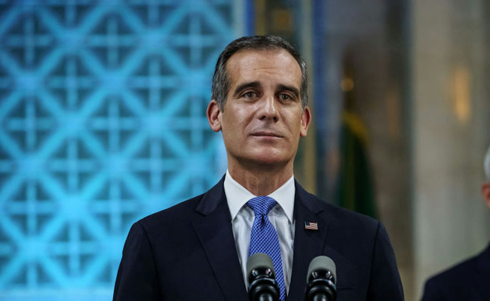 LOS ANGELES, CALIF. -- SUNDAY, APRIL 19, 2020: Los Angeles Mayor Eric Garcetti tears up as he gives his annual 'State of the City' speech at City Hall in Los Angeles, Calif., on April 19, 2020.