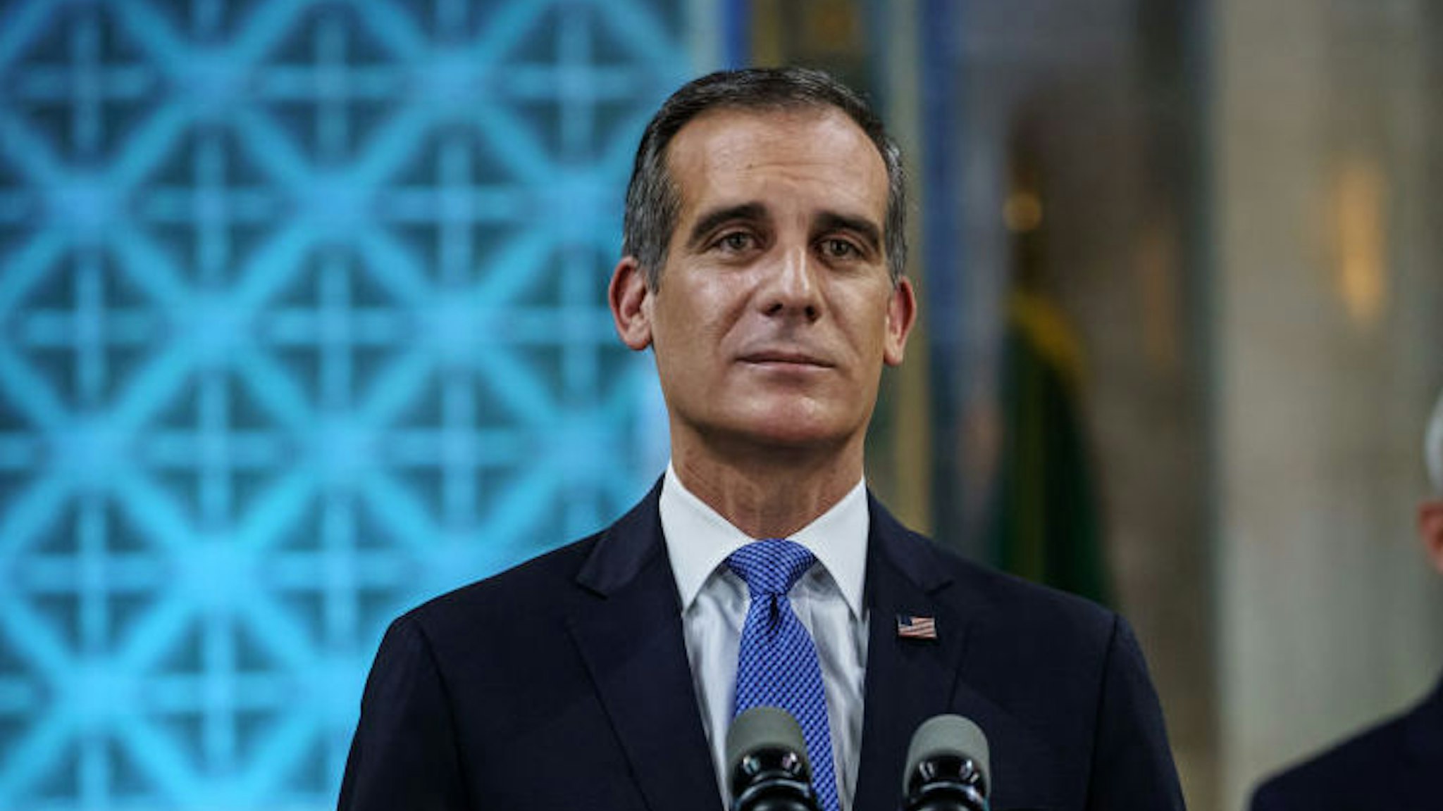 LOS ANGELES, CALIF. -- SUNDAY, APRIL 19, 2020: Los Angeles Mayor Eric Garcetti tears up as he gives his annual 'State of the City' speech at City Hall in Los Angeles, Calif., on April 19, 2020.