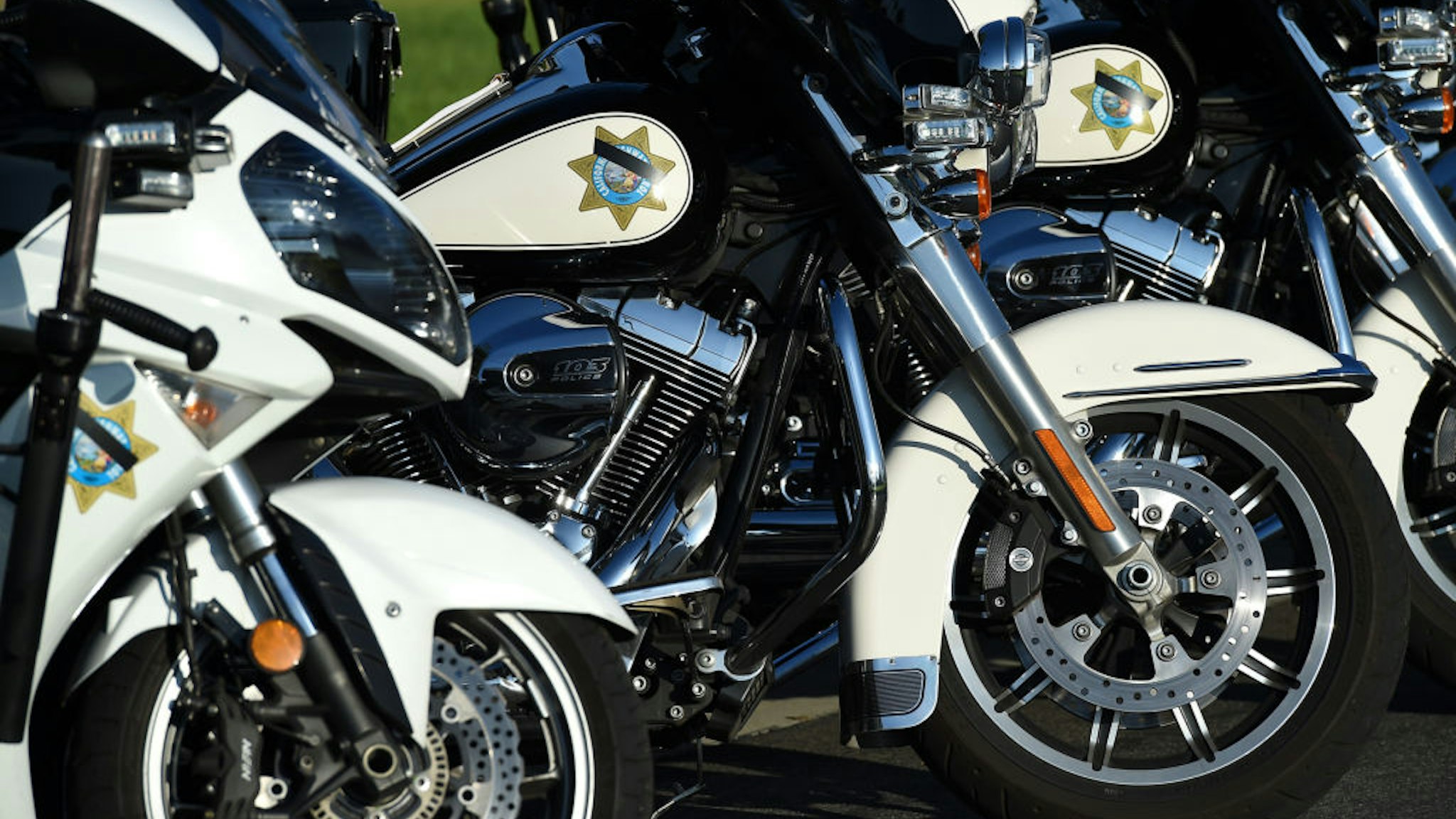 California Highway Patrol motorcycles line up for the procession for CHP Officer Andre Moye Jr., 34, at Acheson and Graham Mortuary in Riverside on Tuesday, Aug. 20, 2019.