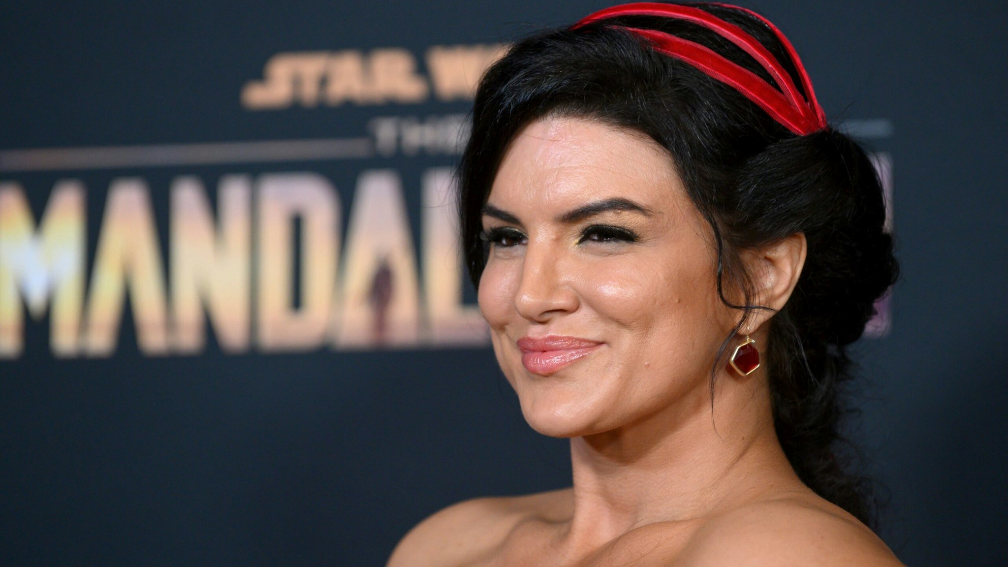 US actress Gina Carano arrives for Disney+ World Premiere of "The Mandalorian" at El Capitan theatre in Hollywood on November 13, 2019. (Photo by Nick Agro / AFP) (Photo by NICK AGRO/AFP via Getty Images)