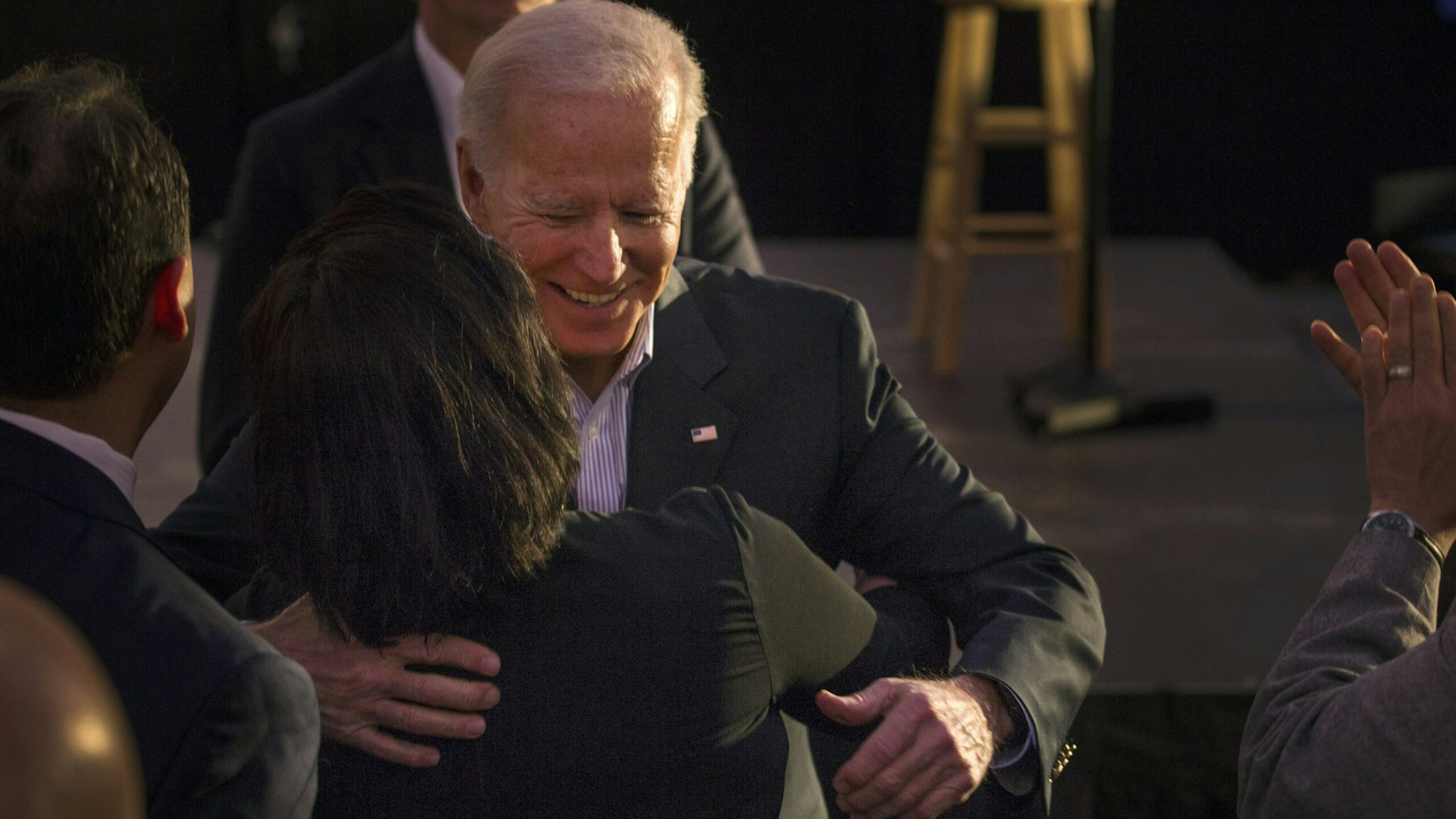 SAN ANTONIO, TX - DECEMBER 13: Democratic presidential candidate and former U.S. Vice President Joe Biden hugs a woman after at a community event while campaigning on December 13, 2019 in San Antonio, Texas. Texas will hold its Democratic primary on March 3, 2020, also known as Super Tuesday. (Photo by Daniel Carde/Getty Images)