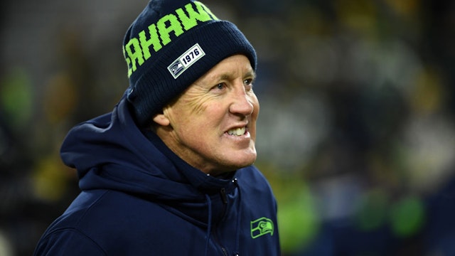 Head coach Pete Carroll of the Seattle Seahawks watches action prior the NFC Divisional Playoff game against the Green Bay Packers at Lambeau Field on January 12, 2020 in Green Bay, Wisconsin.