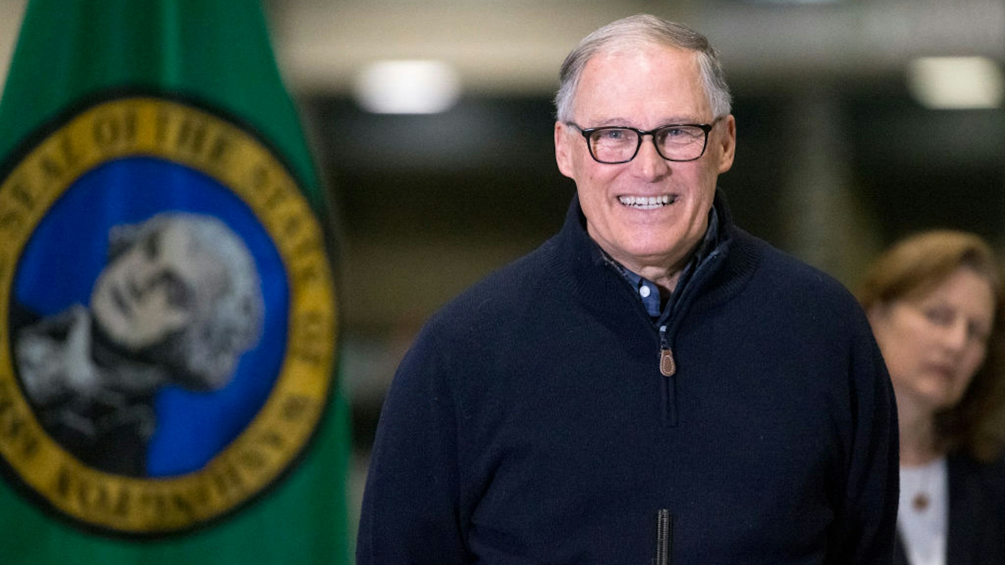 Washington State Governor Jay Inslee and other leaders speak to the press on March 28, 2020 in Seattle, Washington.
