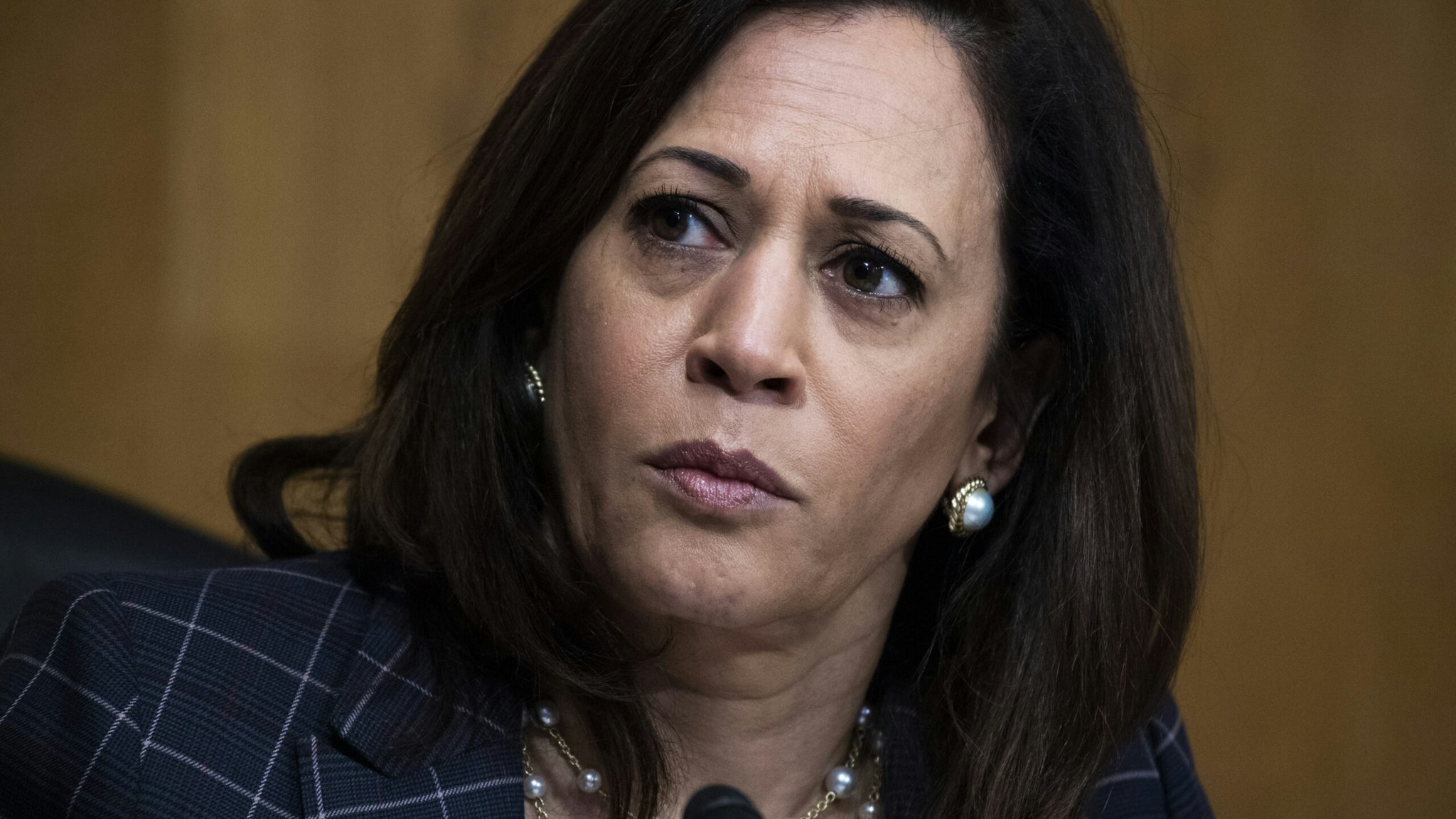 Senator Kamala Harris, a Democrat from California, listens during a Senate Homeland Security and Governmental Affairs Committee hearing in Washington, D.C., U.S., on Thursday, June 25, 2020. Acting commissioner of U.S. Customs and Border Protection, Mark Morgan, said this week said at a roundtable event with President Donald Trump that he's "100% convinced" that 450 miles of the border wall with Mexico will be completed by the end of the year. Photographer: Tom Williams/CQ Roll Call/Bloomberg via Getty Images
