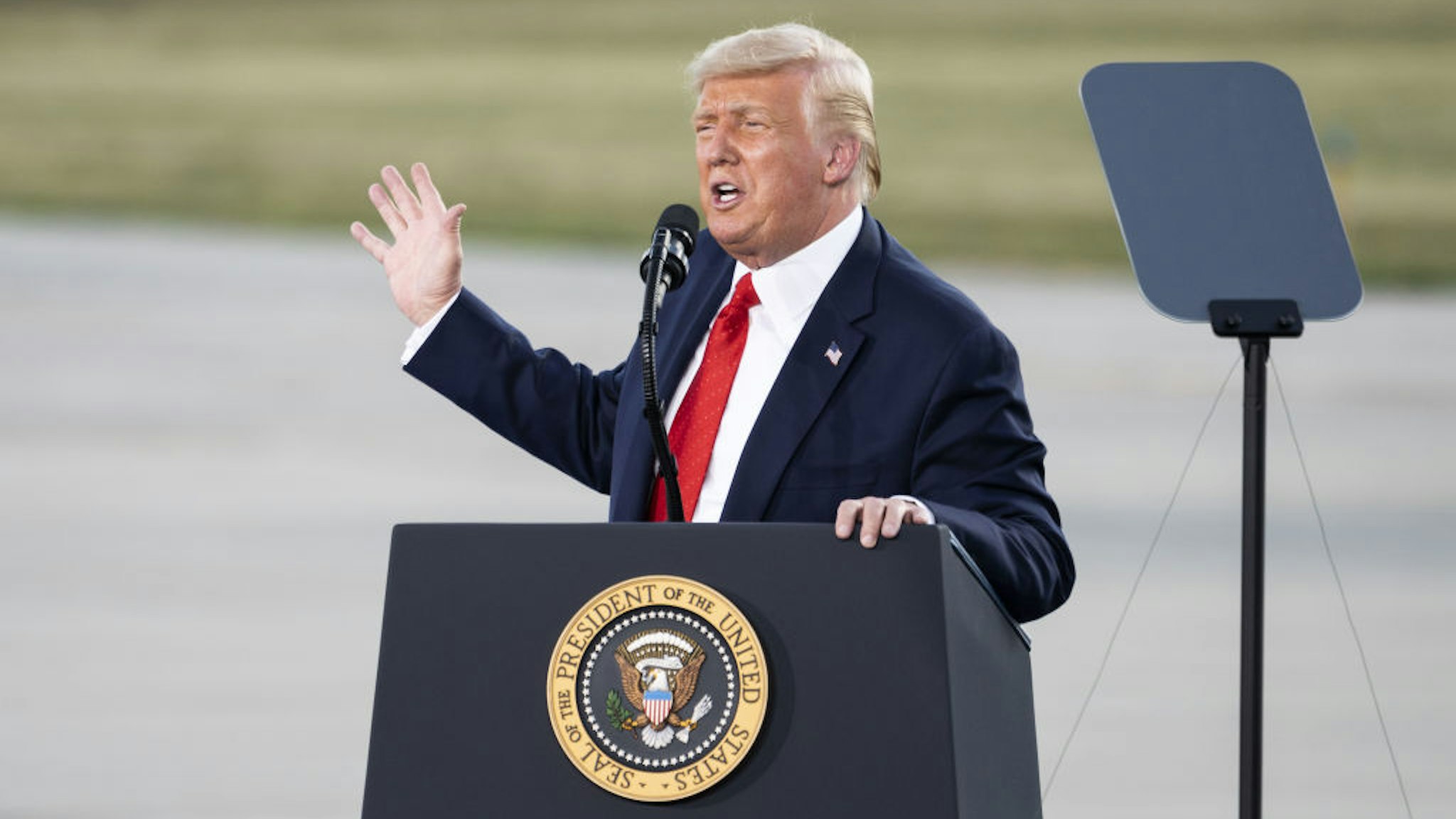 U.S. President Donald Trump speaks during a campaign rally at Wittman Regional Airport Basler Flight Service Hangar in Oshkosh, Wisconsin, U.S., on Monday, Aug. 17, 2020.