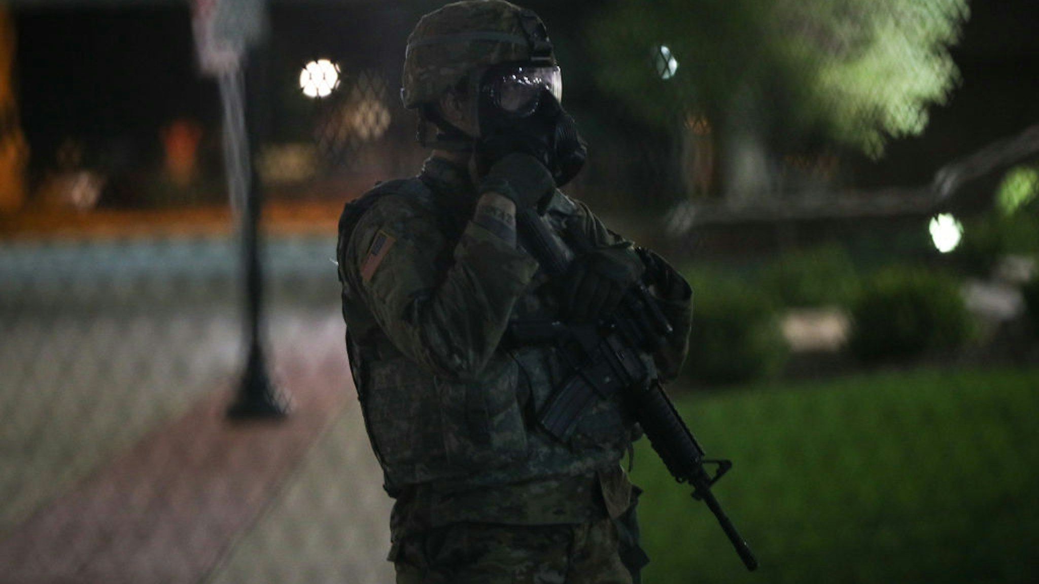 KENOSHA, WISCONSIN, USA - AUGUST 25: Police take security measurements during a third night of unrest on August 25, 2020 in Kenosha, Wisconsin, United States. Wisconsin expands Natâl Guard presence amid unrest. Governor declares state of emergency as civil unrest in Kenosha continues after Black man was shot several times at close range in the back during an encounter with a police officer on Sunday. (Photo by Tayfun Coskun/Anadolu Agency via Getty Images)