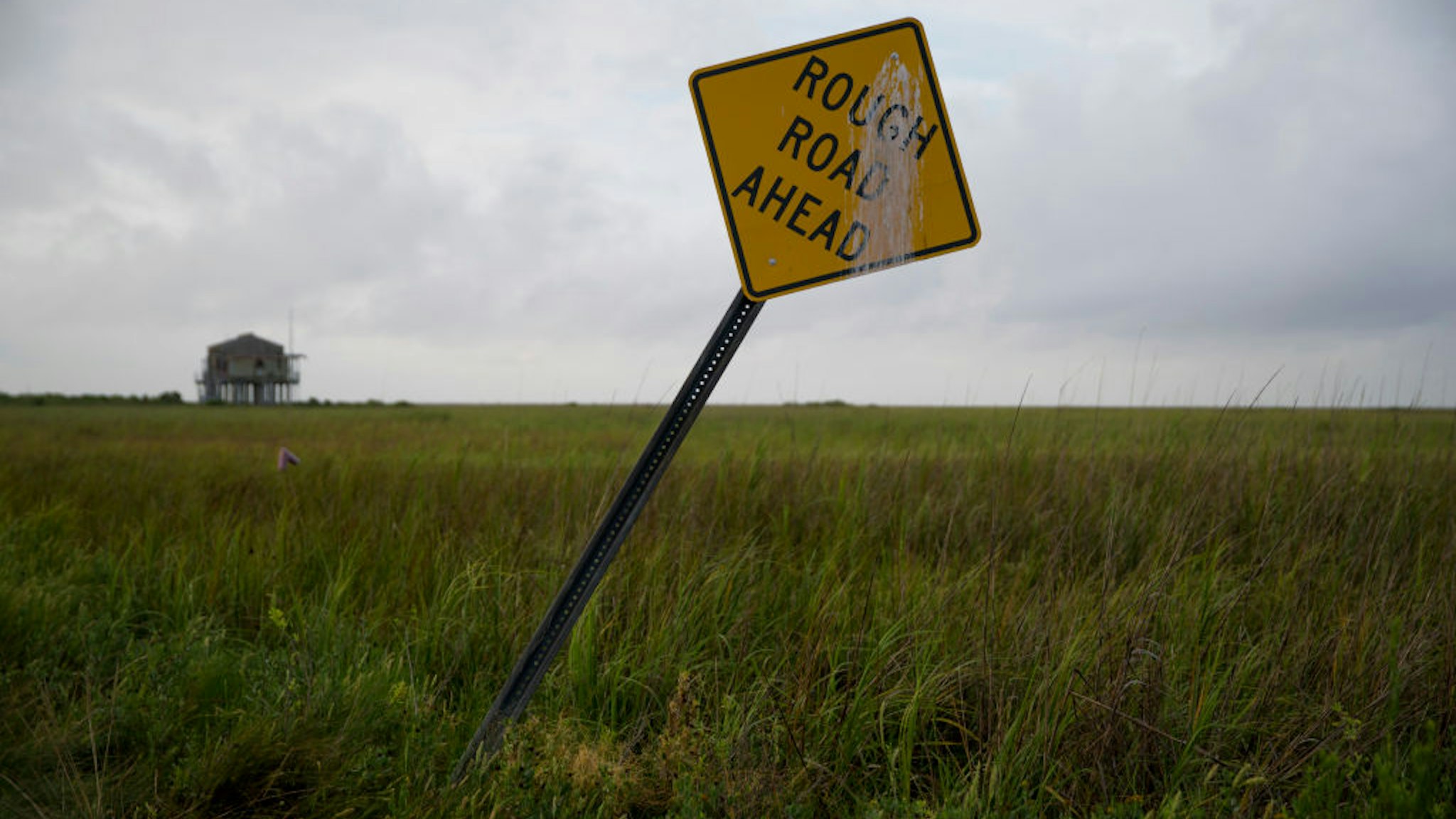 SABINE PASS, TX - AUGUST 26: A general view of a street sign in a field ahead of Hurricane Laura on August 26, 2020 in Sabine Pass, Texas. Hurricane Laura, currently a Category 4 storm, is expected to make landfall along the Gulf Coast late Wednesday and early Thursday. (Photo by Eric Thayer/Getty Images)