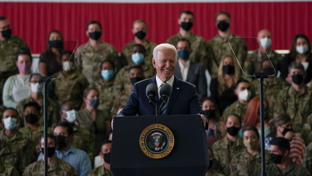 MILDENHALL, ENGLAND - JUNE 09: US President Joe Biden addresses US Air Force personnel at RAF Mildenhall in Suffolk, ahead of the G7 summit in Cornwall, on June 9, 2021 in Mildenhall, England. On June 11, Prime Minister Boris Johnson will host the Group of Seven leaders at a three-day summit in Cornwall, as the wealthiest nations look to chart a course for recovery from the global pandemic. (Photo by Joe Giddens - WPA Pool/Getty Images)