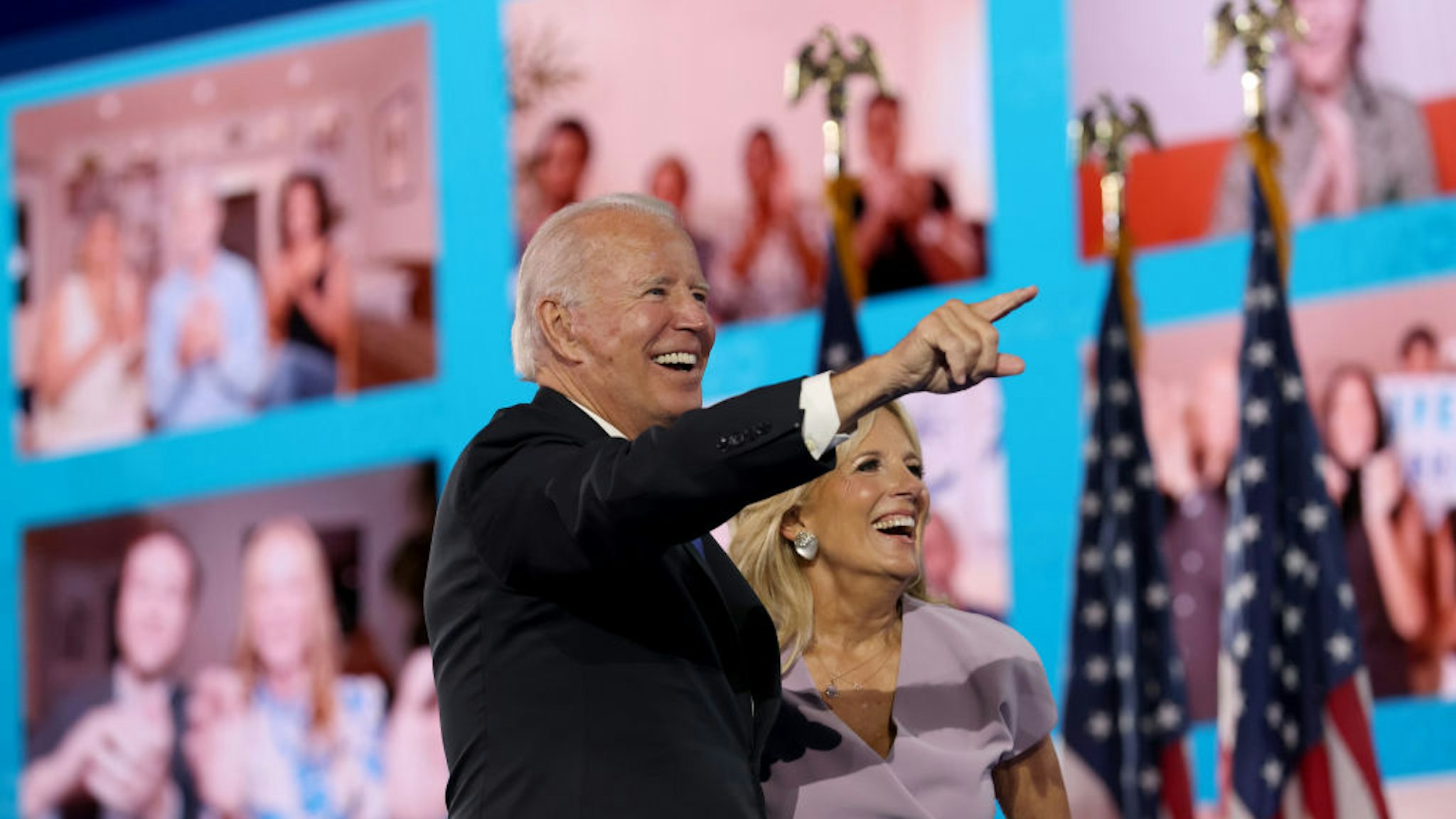 WILMINGTON, DELAWARE - AUGUST 20: : Democratic presidential nominee Joe Biden and his wife Dr. Jill Biden wave to supporters via video teleconference after Biden delivered his acceptance speech on the fourth night of the Democratic National Convention from the Chase Center on August 20, 2020 in Wilmington, Delaware. The convention, which was once expected to draw 50,000 people to Milwaukee, Wisconsin, is now taking place virtually due to the coronavirus pandemic. (Photo by Win McNamee/Getty Images)