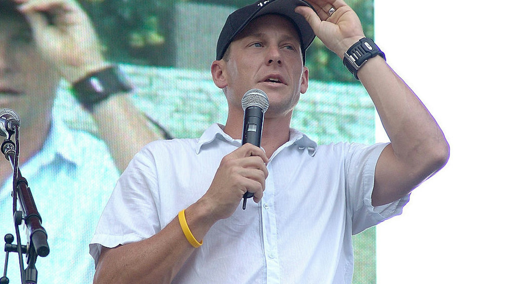 Lance Armstrong speaks to the crowd at his "Thank You Austin" event after his seventh Tour De France win at Auditorium Shores on October 02, 2005 in Austin, Texas.